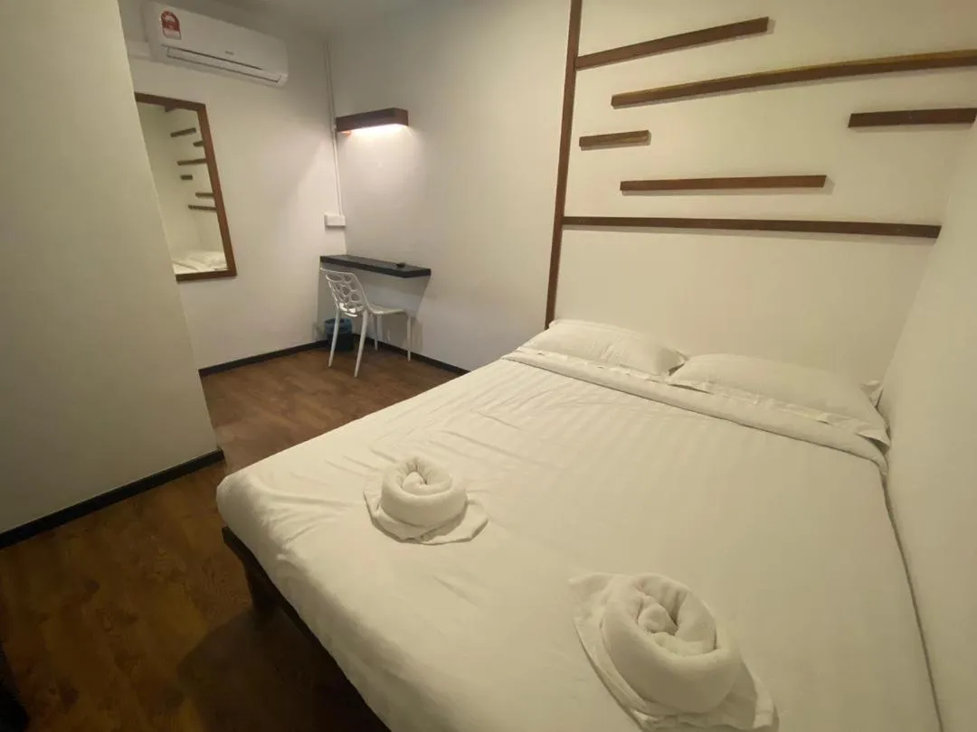 Bed in Kuching Hotel