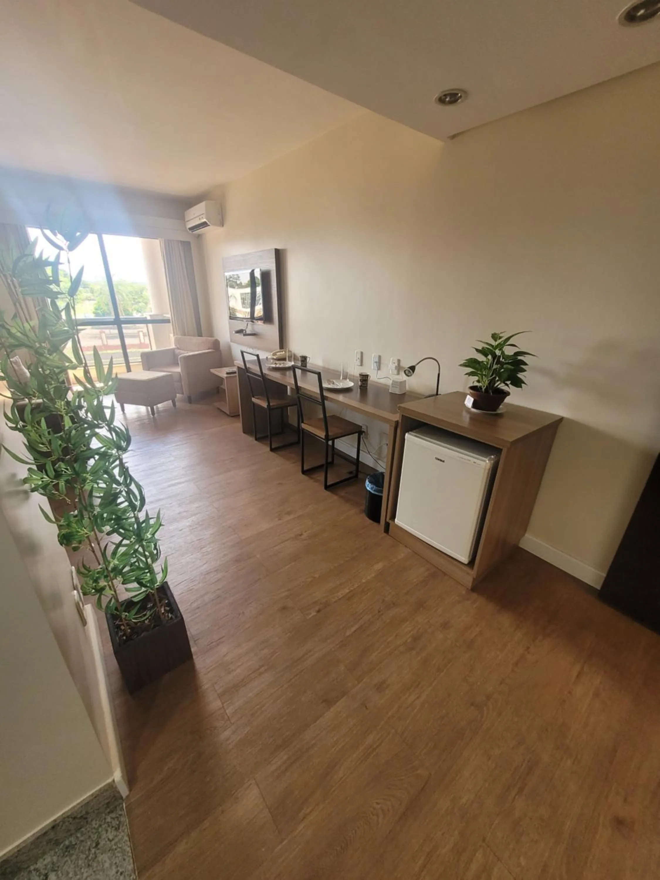 Seating area in Lake Side Beira do Lago - piscina - academia - sauna- By Rei dos Flats