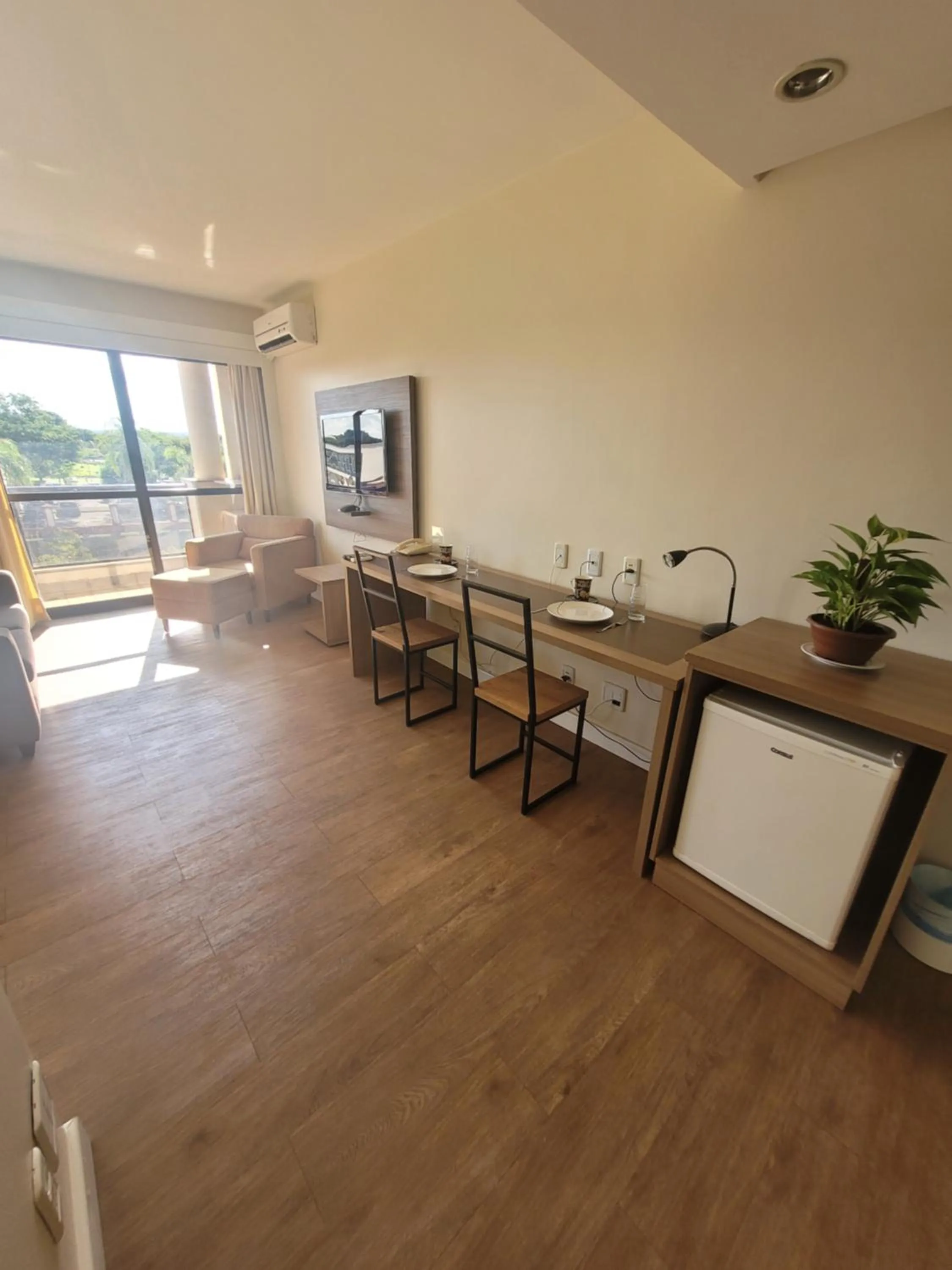 Photo of the whole room in Lake Side Beira do Lago - piscina - academia - sauna- By Rei dos Flats