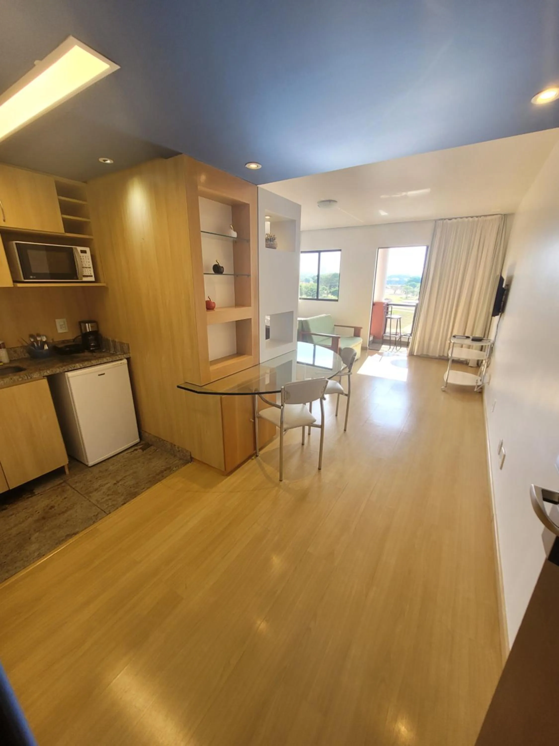 Kitchen or kitchenette in Lake Side Beira do Lago - piscina - academia - sauna- By Rei dos Flats