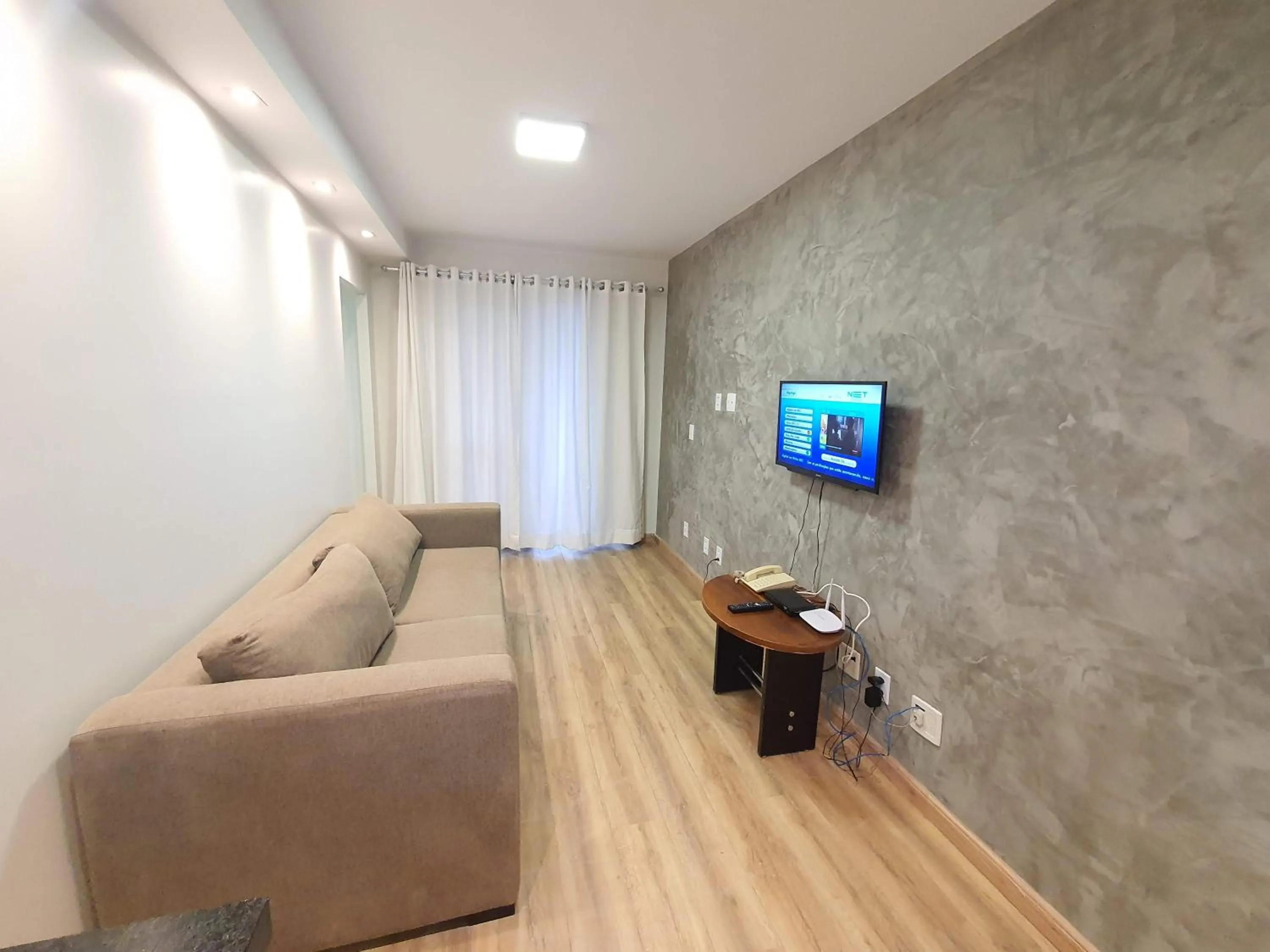 Communal lounge/ TV room in Lake Side Beira do Lago - piscina - academia - sauna- By Rei dos Flats