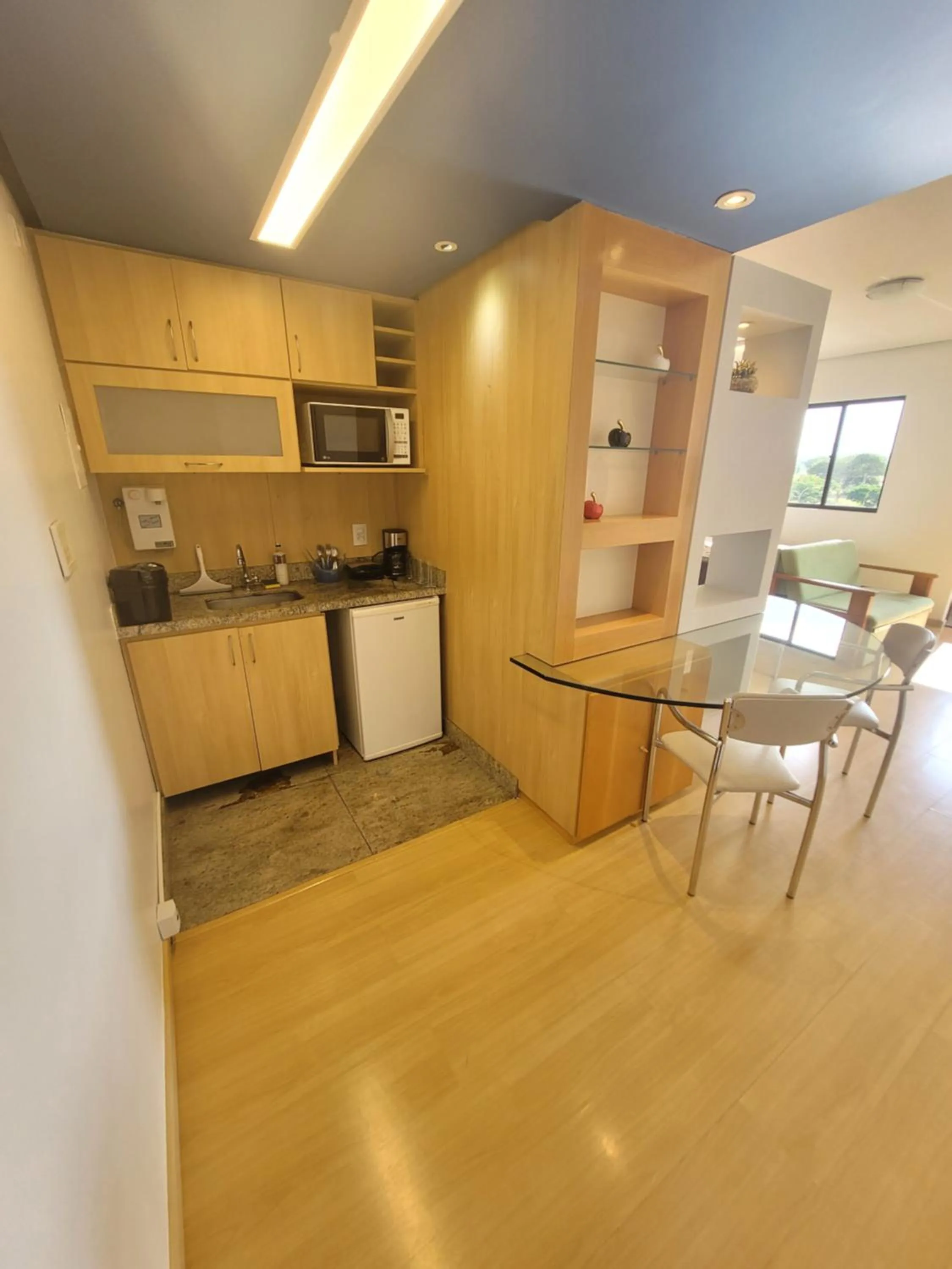Kitchen or kitchenette in Lake Side Beira do Lago - piscina - academia - sauna- By Rei dos Flats