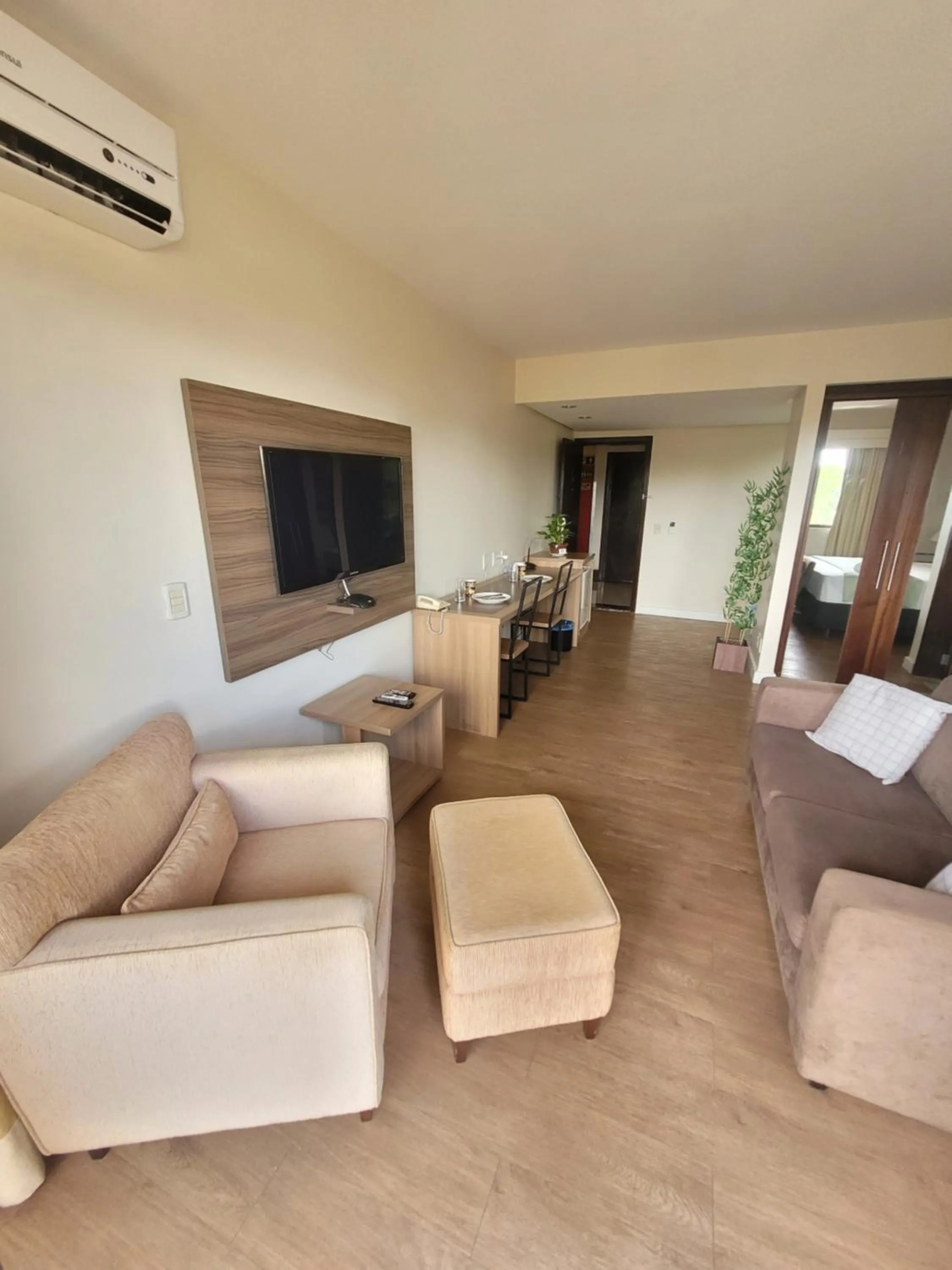 Communal lounge/ TV room in Lake Side Beira do Lago - piscina - academia - sauna- By Rei dos Flats