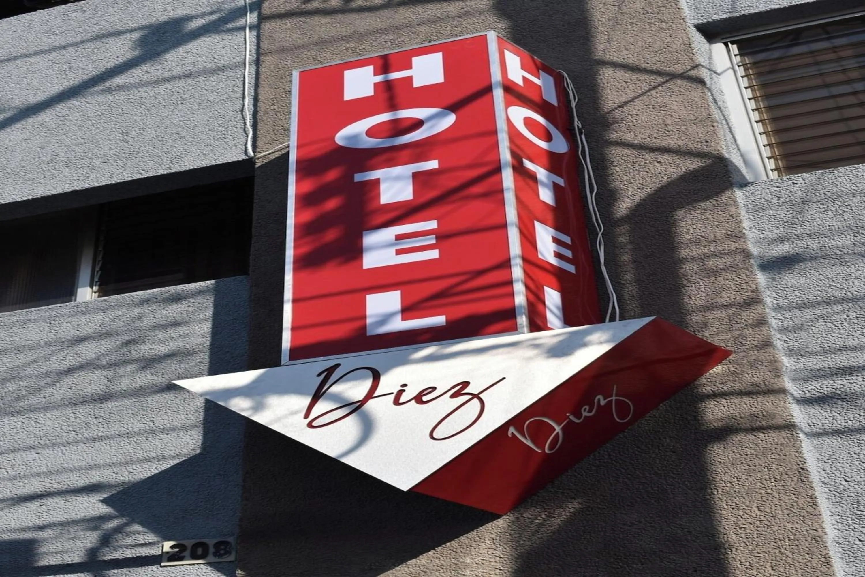 Property logo or sign in Capital O Hotel Diez