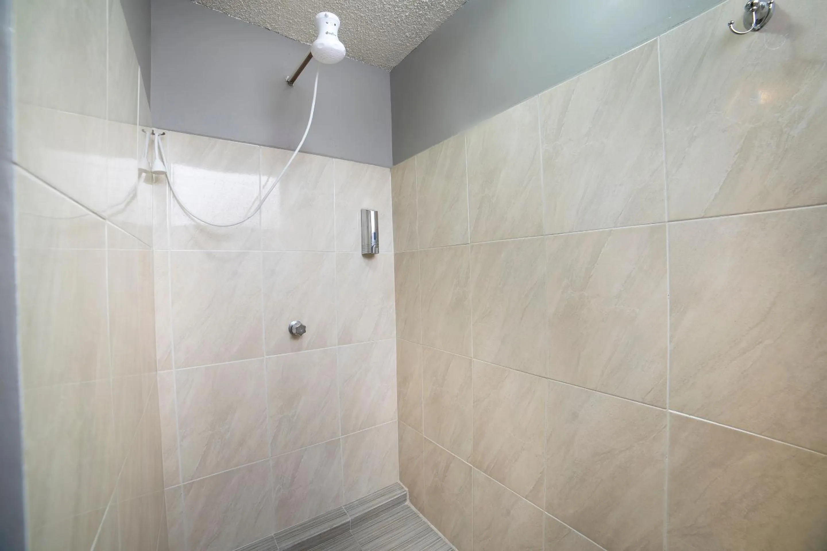 Bathroom in Capital O Hotel Diez