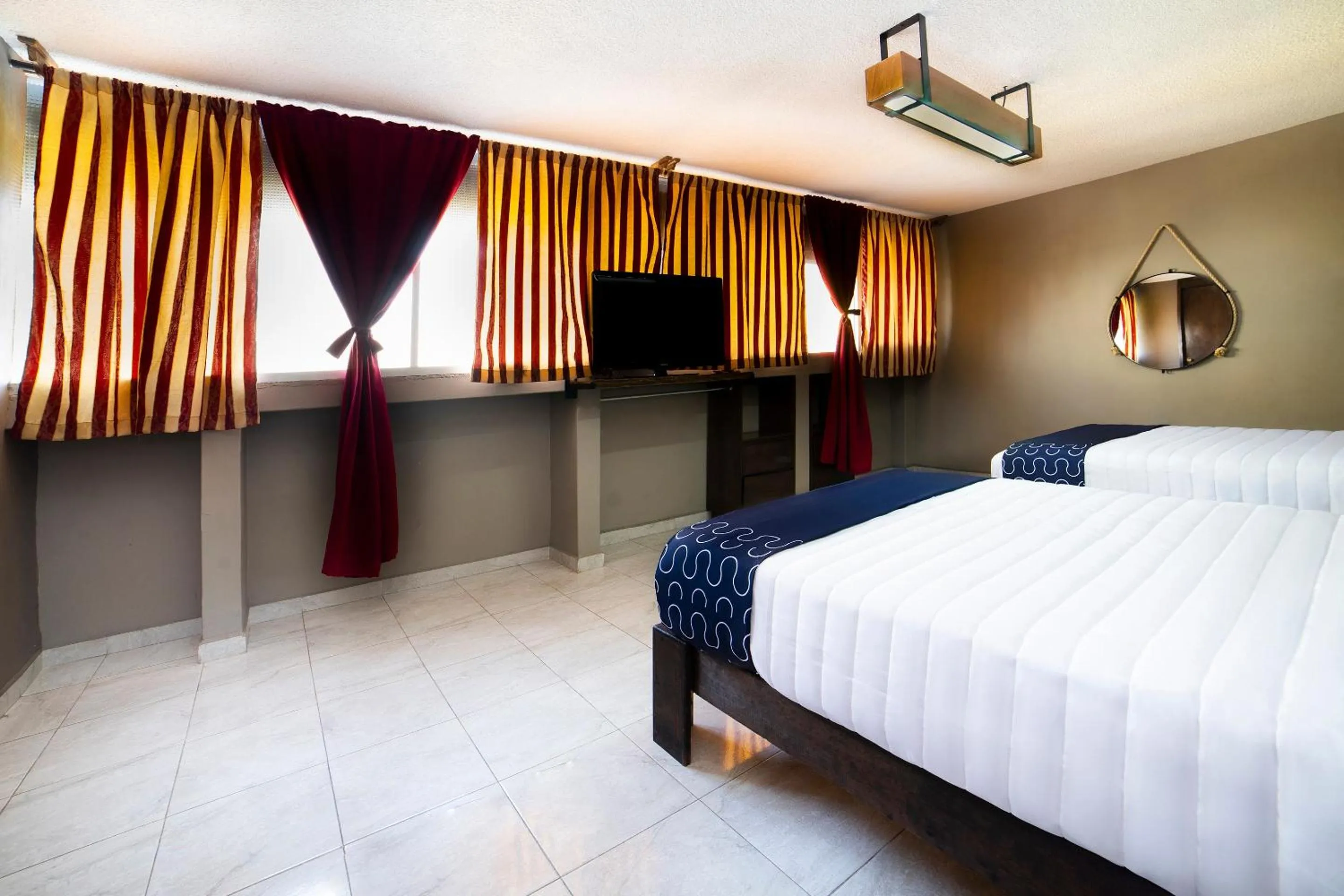 Bedroom, Bed in Capital O Hotel Diez