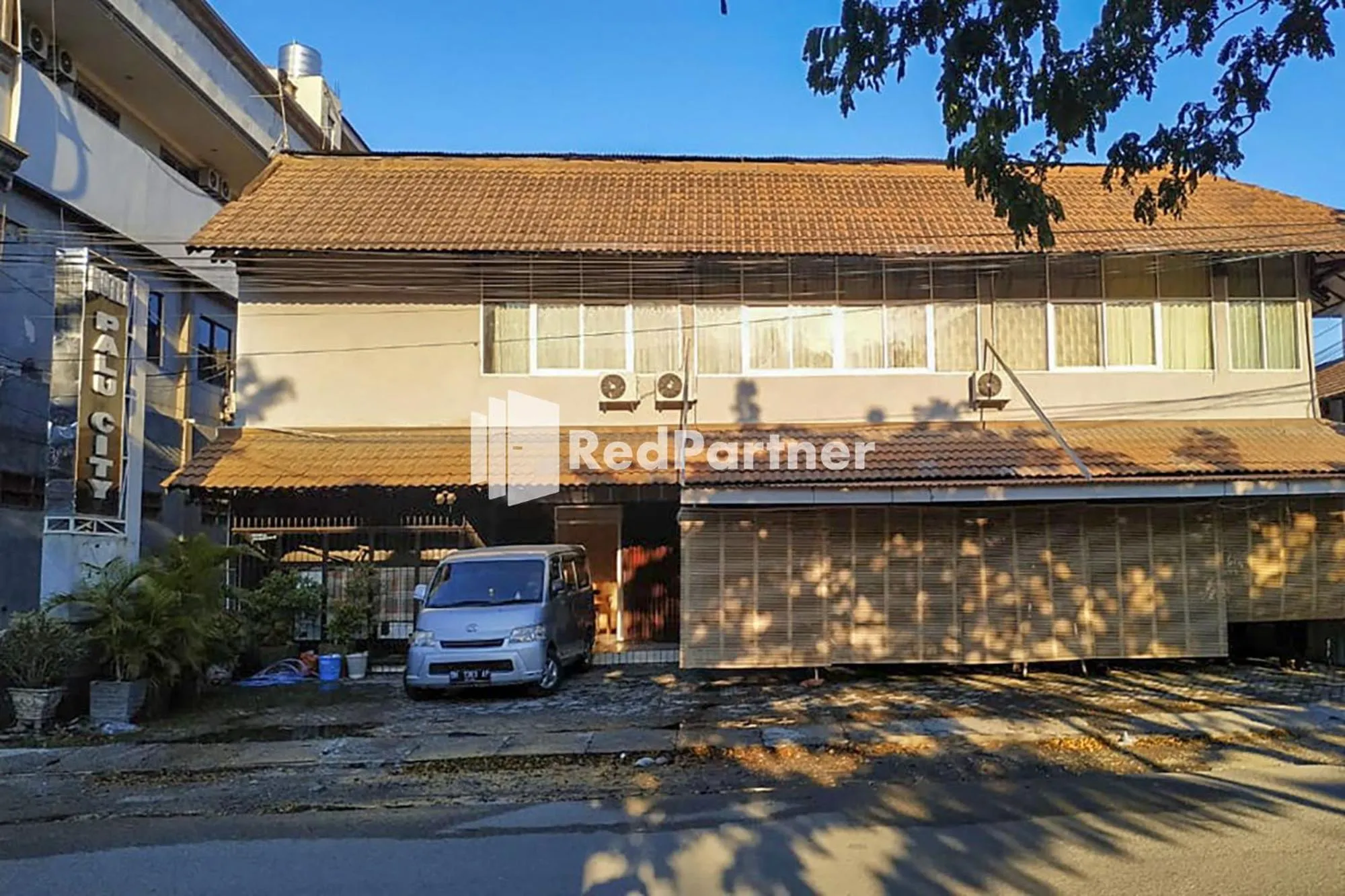 Property building in Palu City Guest House Mitra RedDoorz