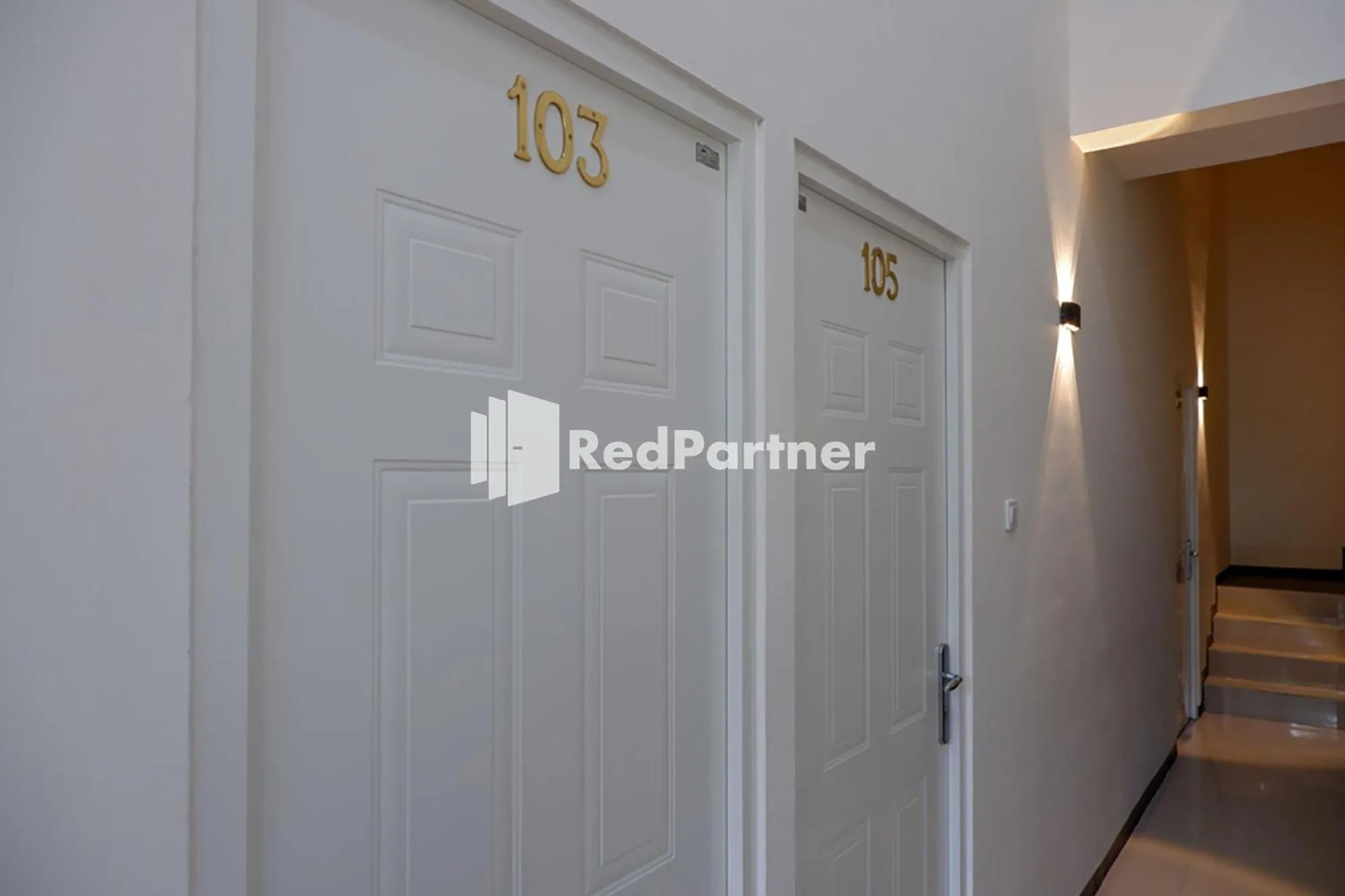 Facade/entrance in Rit's Garden At CitraGrand Semarang Mitra RedDoorz