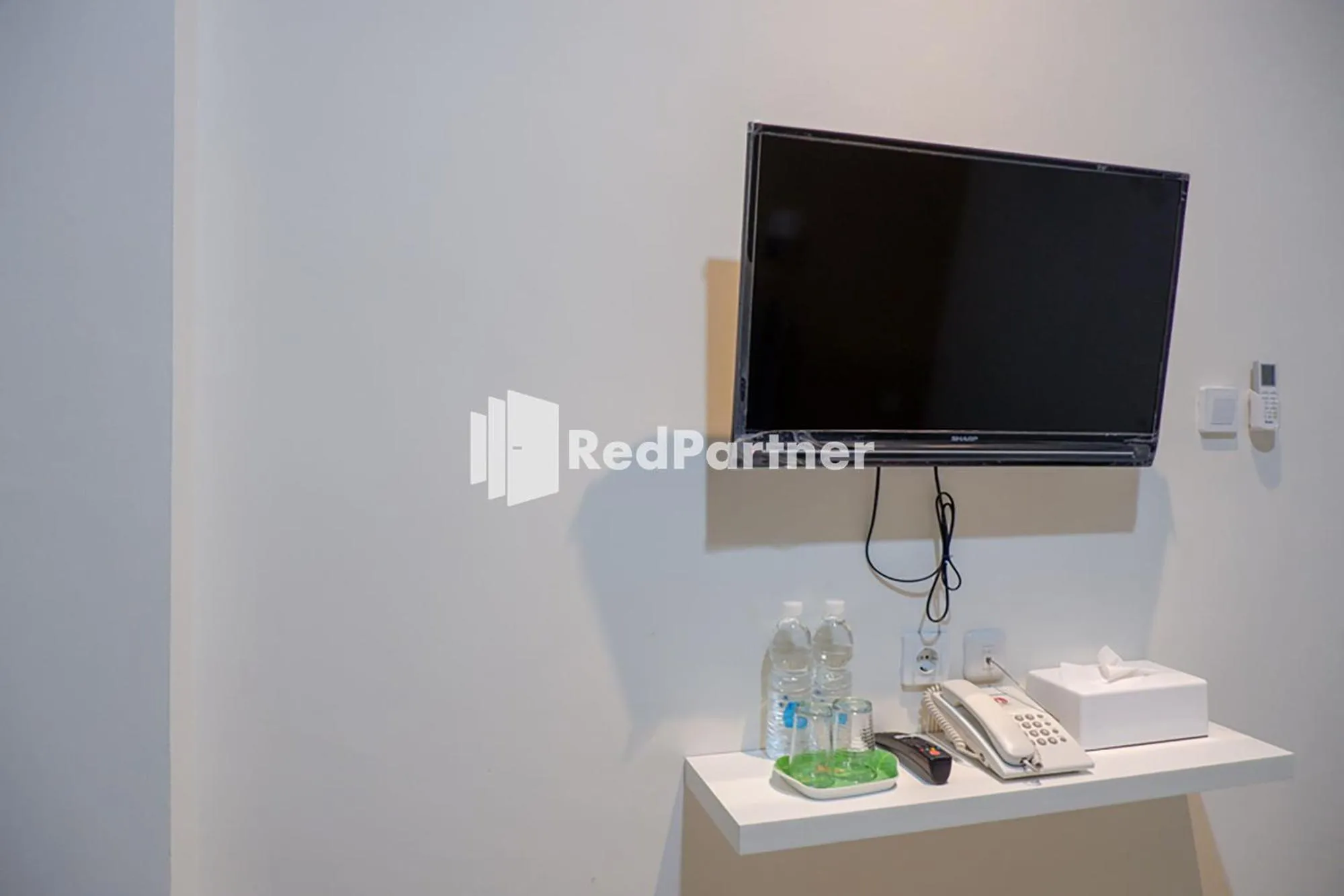 TV and multimedia in Rit's Garden At CitraGrand Semarang Mitra RedDoorz