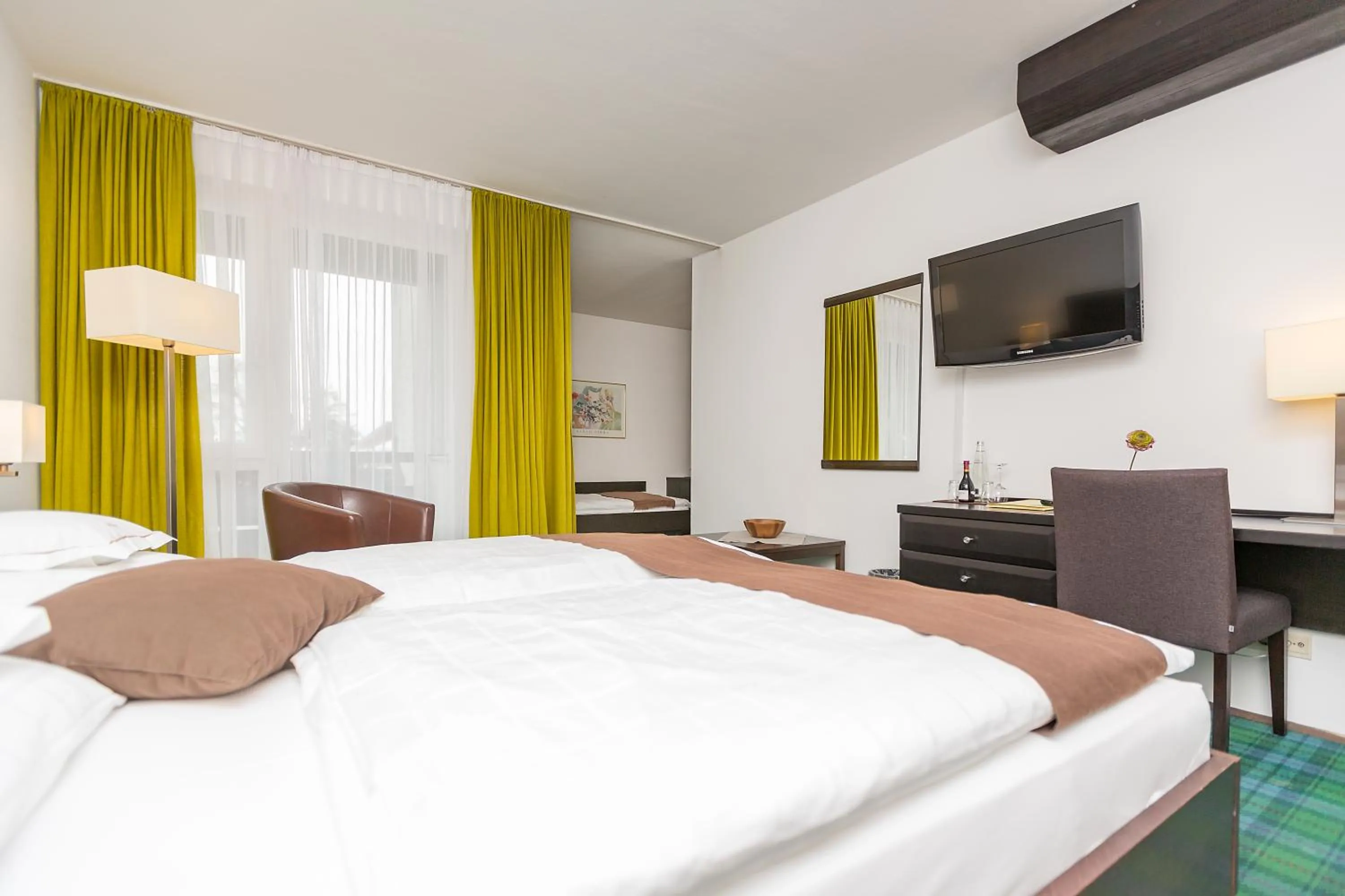 Photo of the whole room, Bed in Hotel Alpenhof Postillion