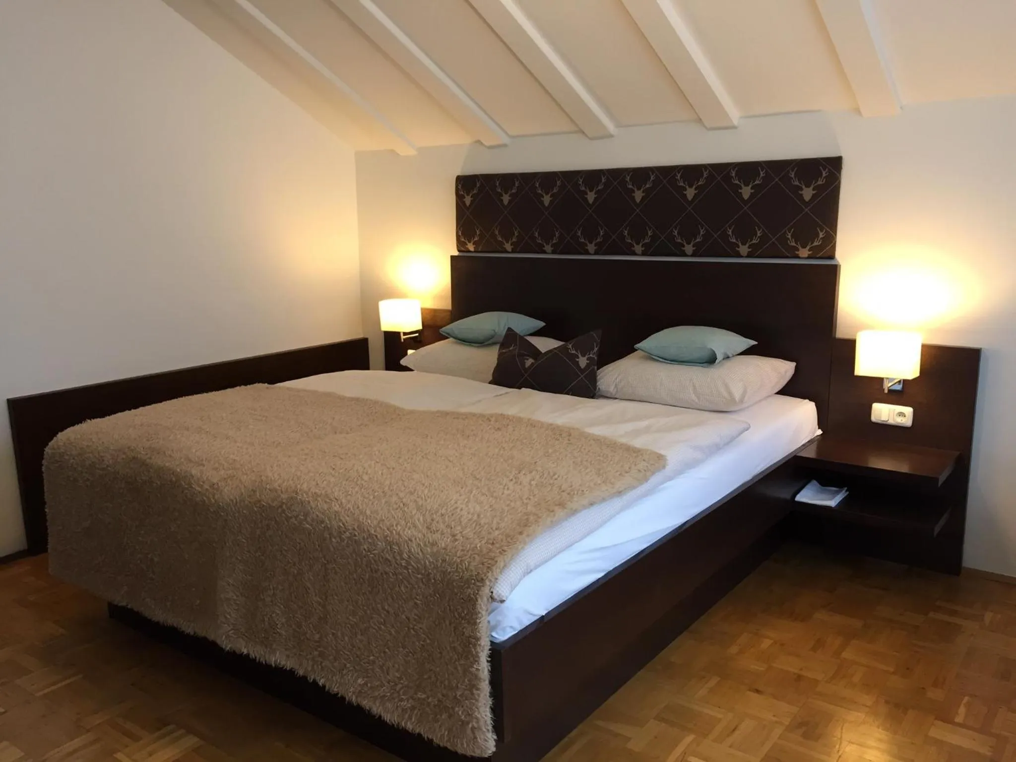 Photo of the whole room, Bed in Hotel Alpenhof Postillion