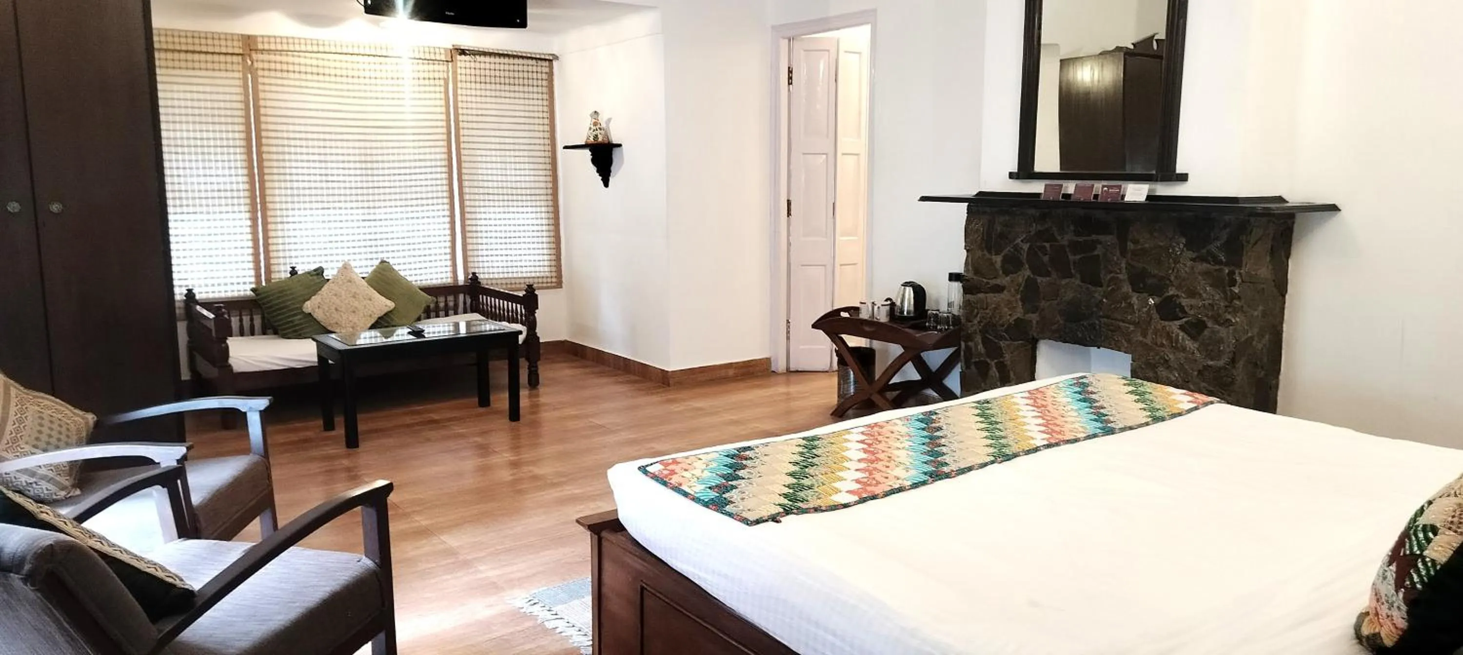 Photo of the whole room in Bhikampur Lodge By Nine Hotels