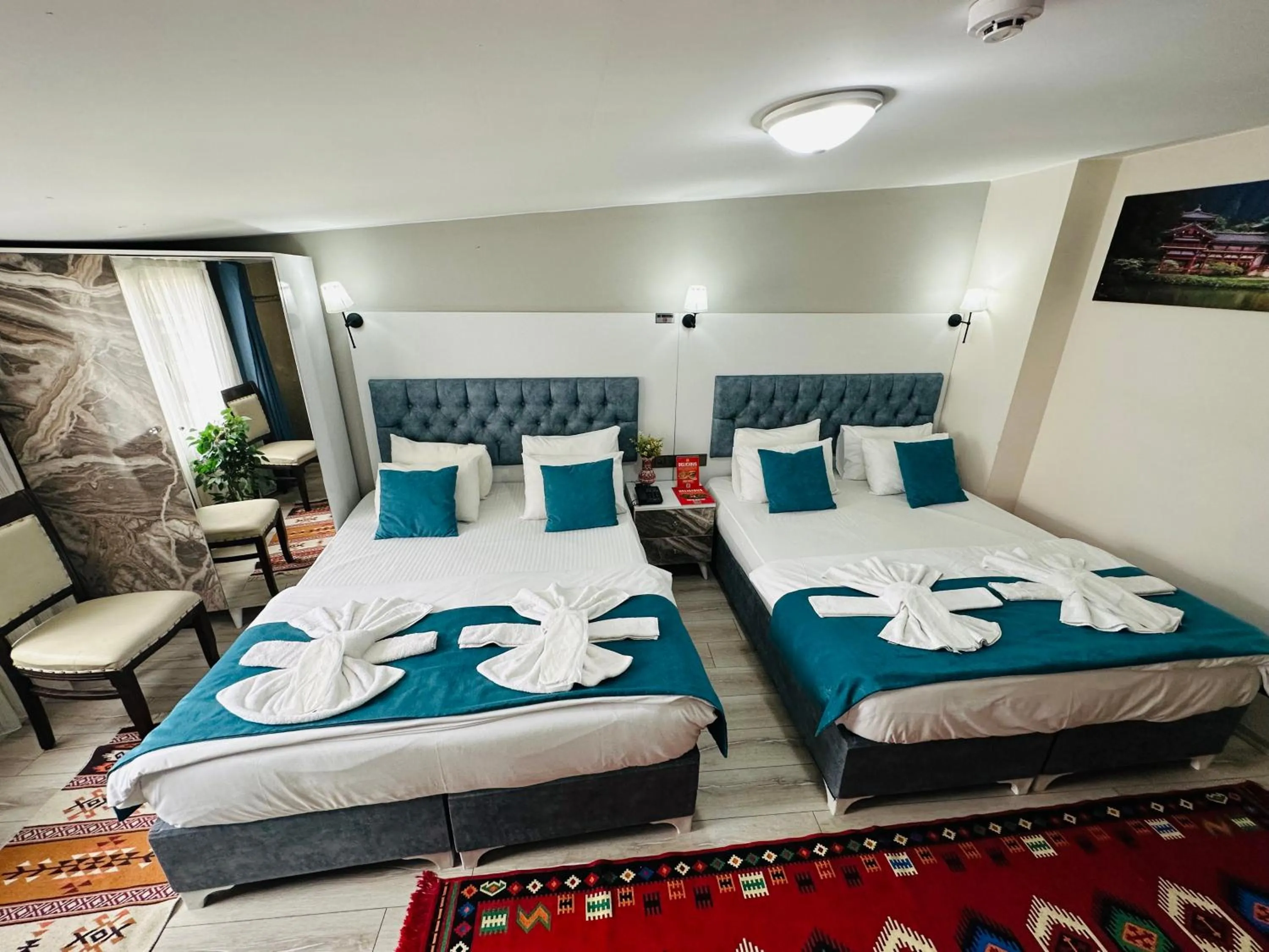 Photo of the whole room, Bed in Galapera Hotel