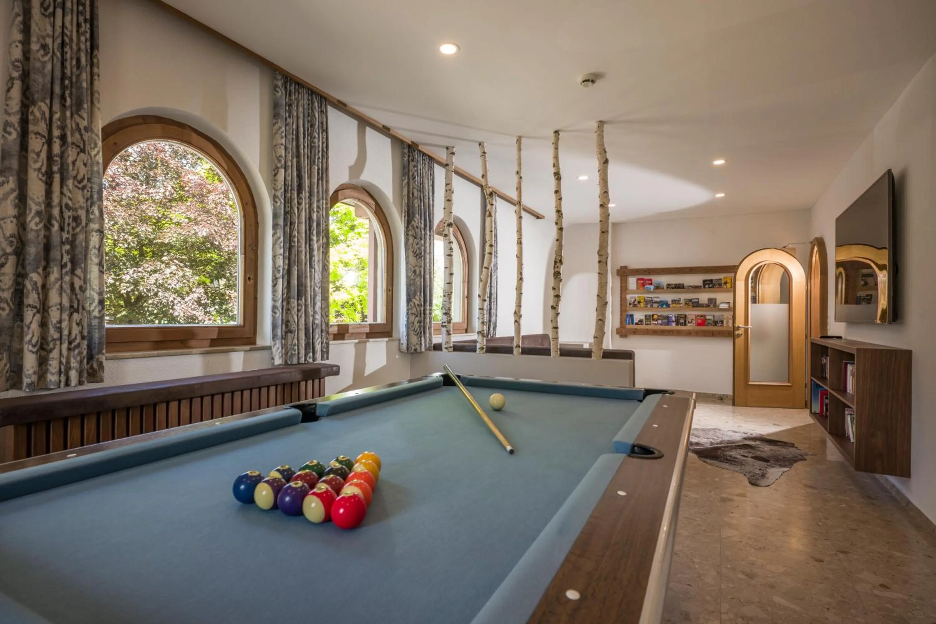 Communal lounge/ TV room in Aparthotel Brandauerhof