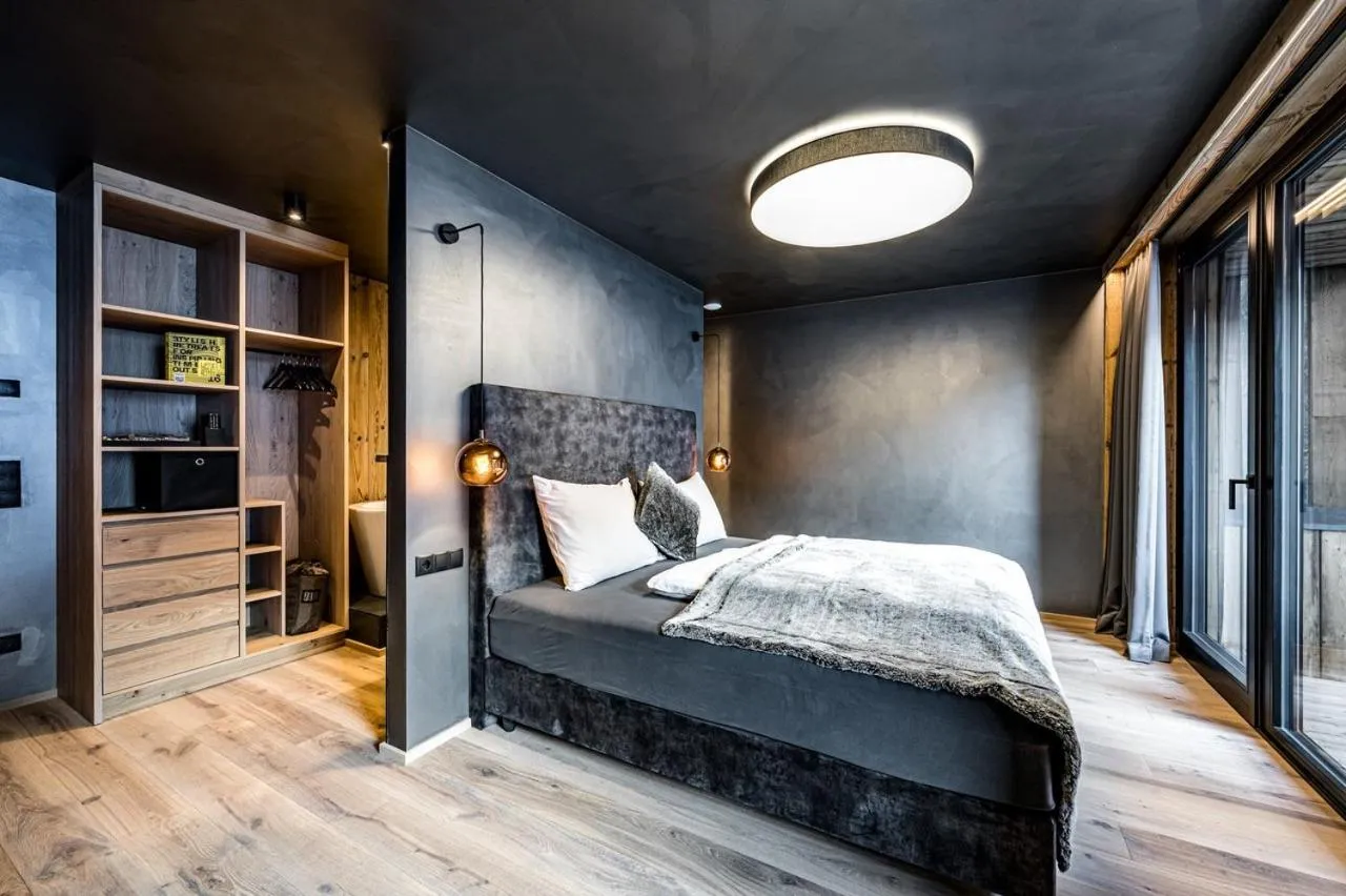 Bed in ALMMONTE PRÄCLARUM SUITES - Casual Boutique Hotel