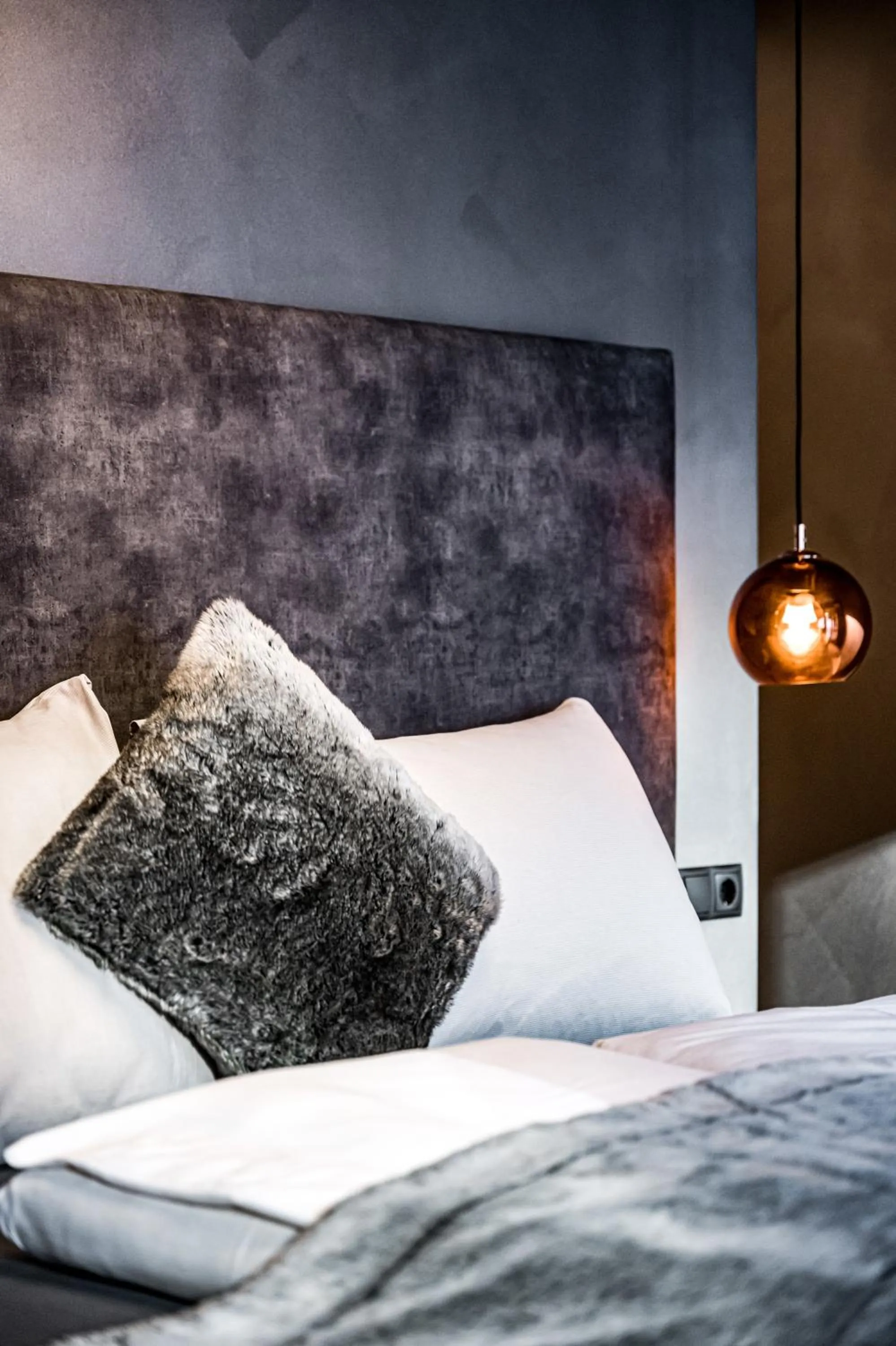 Bed in ALMMONTE PRÄCLARUM SUITES - Casual Boutique Hotel