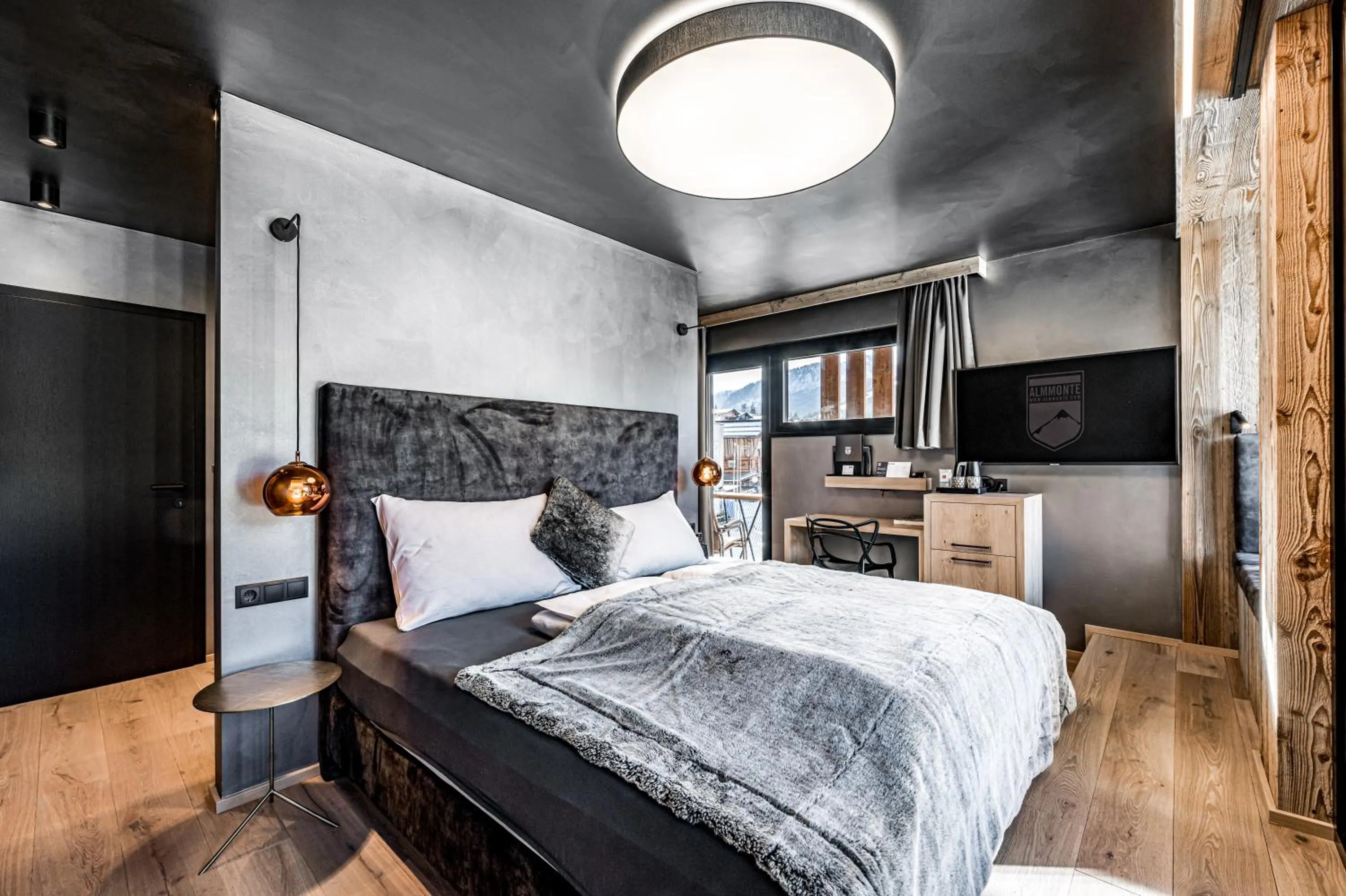 Bed in ALMMONTE PRÄCLARUM SUITES - Casual Boutique Hotel