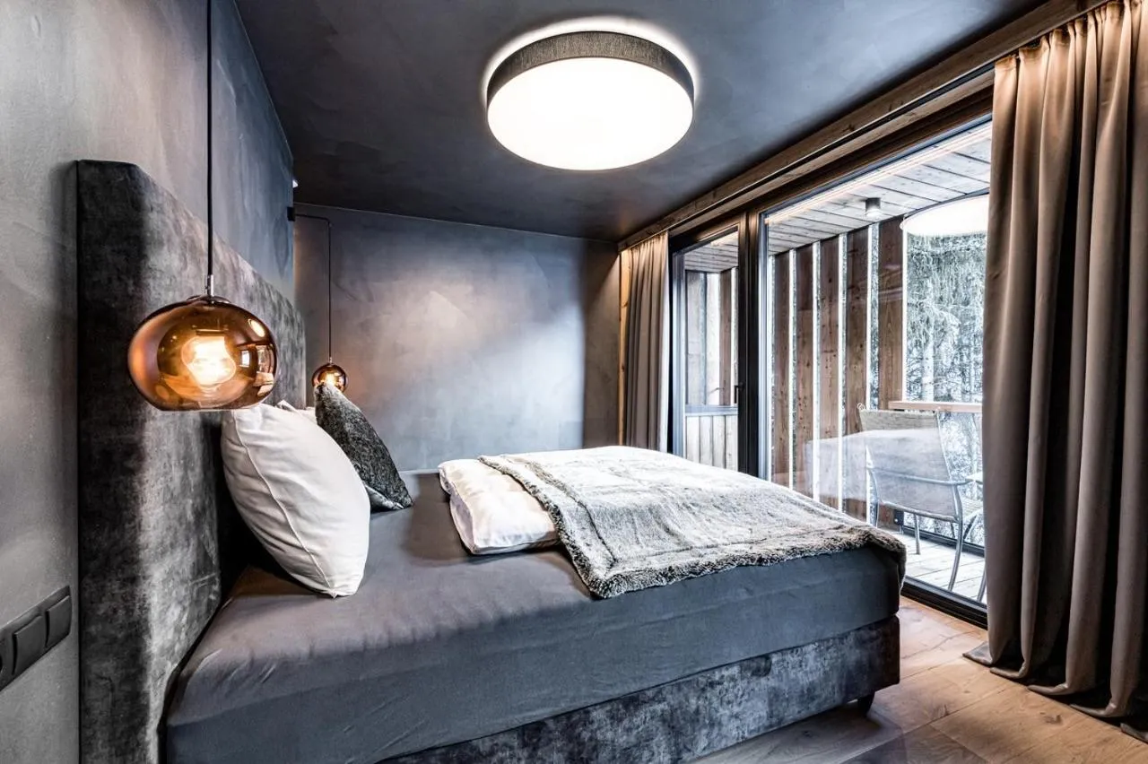 Bed in ALMMONTE PRÄCLARUM SUITES - Casual Boutique Hotel