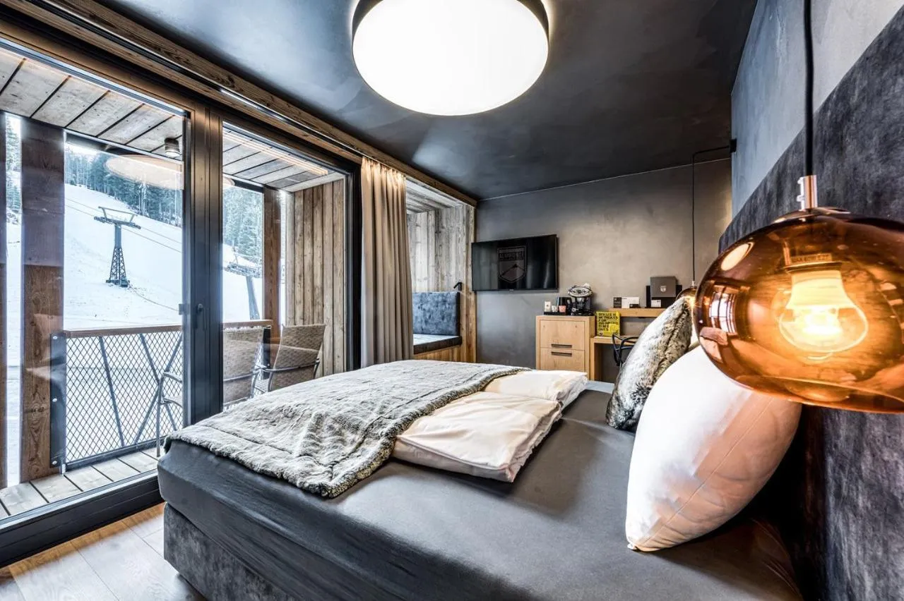 Bed in ALMMONTE PRÄCLARUM SUITES - Casual Boutique Hotel