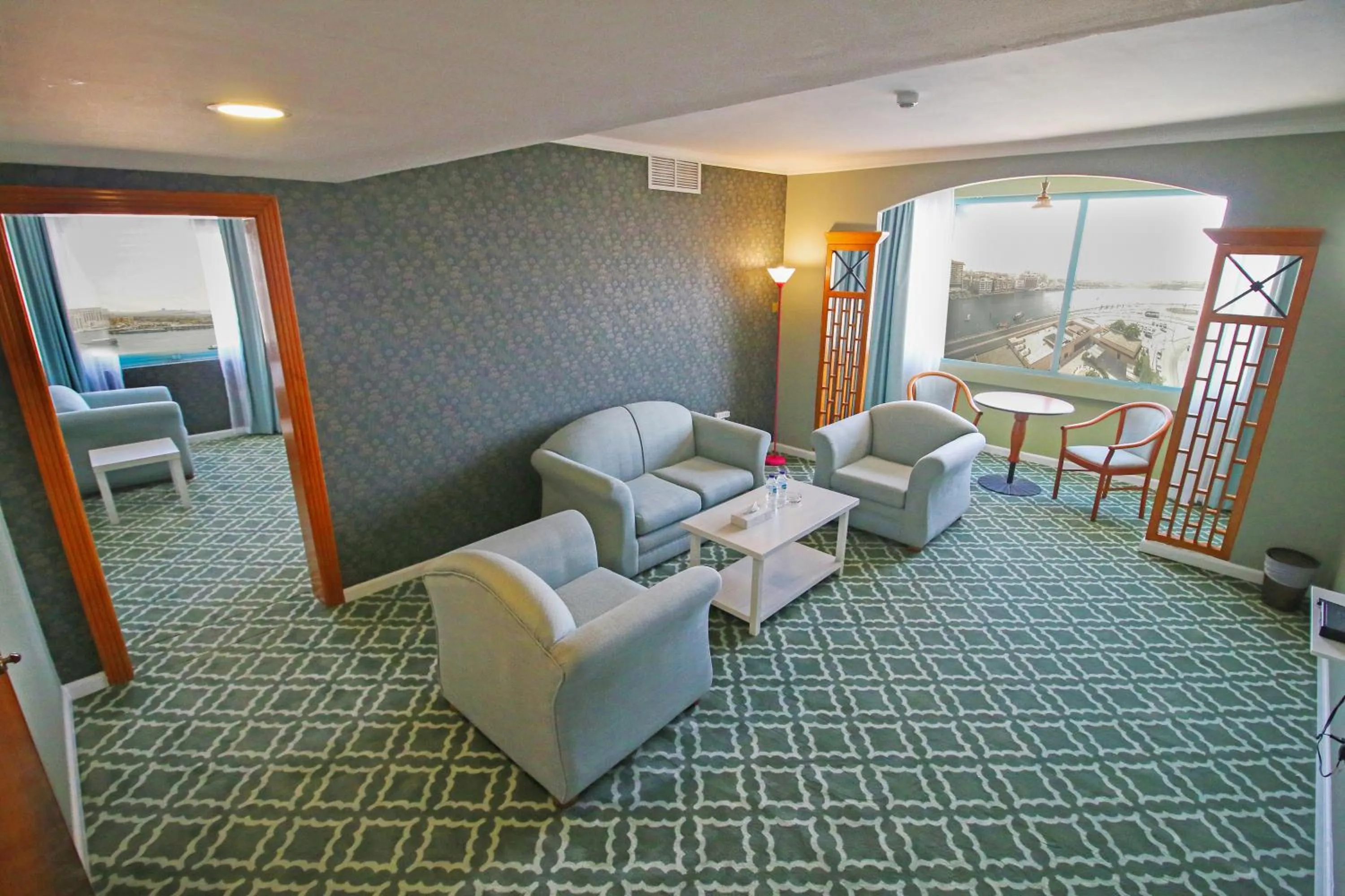 Living room in The George Hotel by Saffron, Dubai Creek