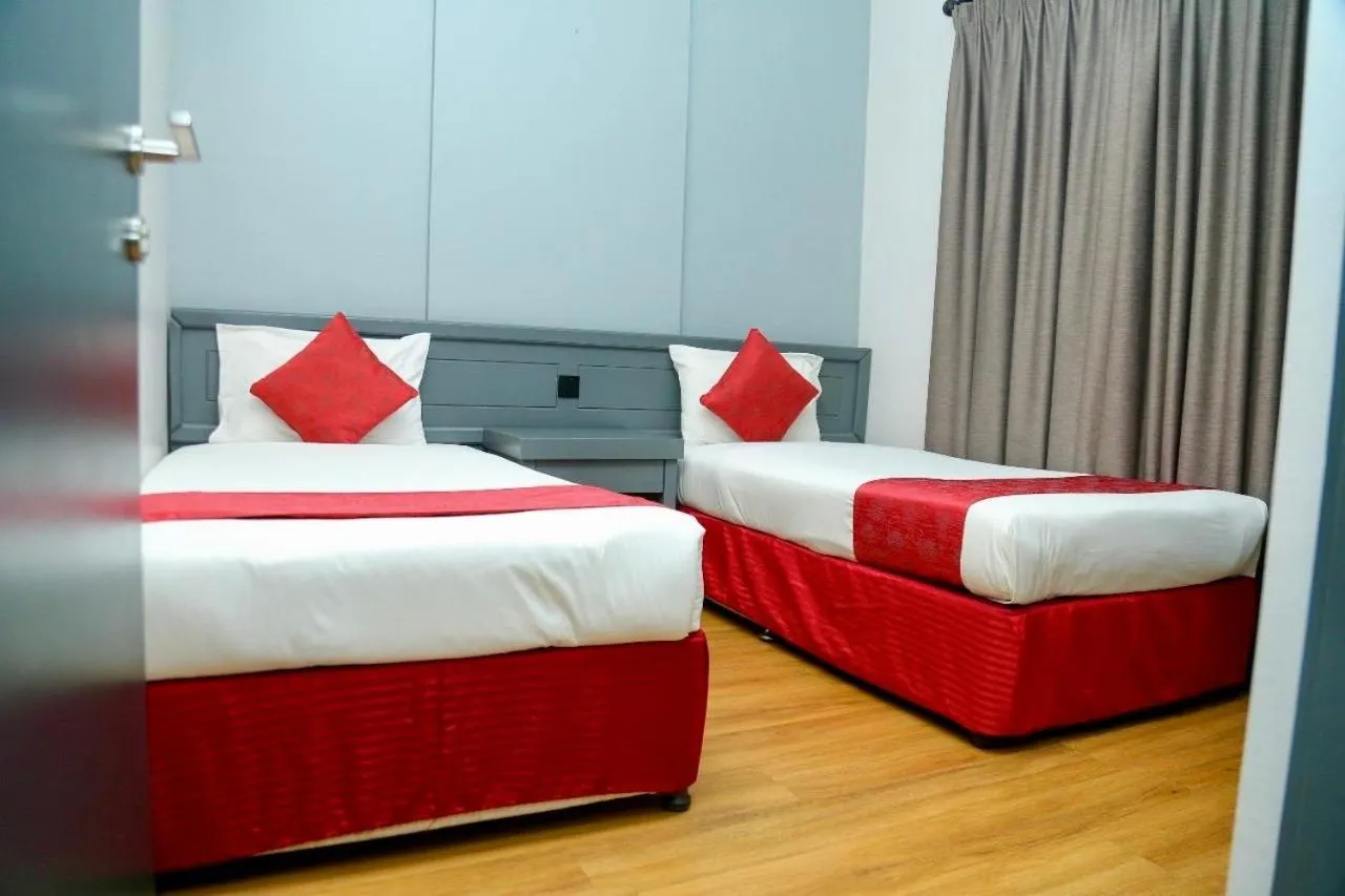 Bed in Al Sharq Hotel