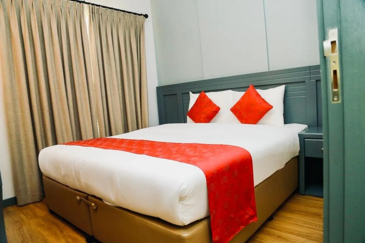 Bed in Al Sharq Hotel