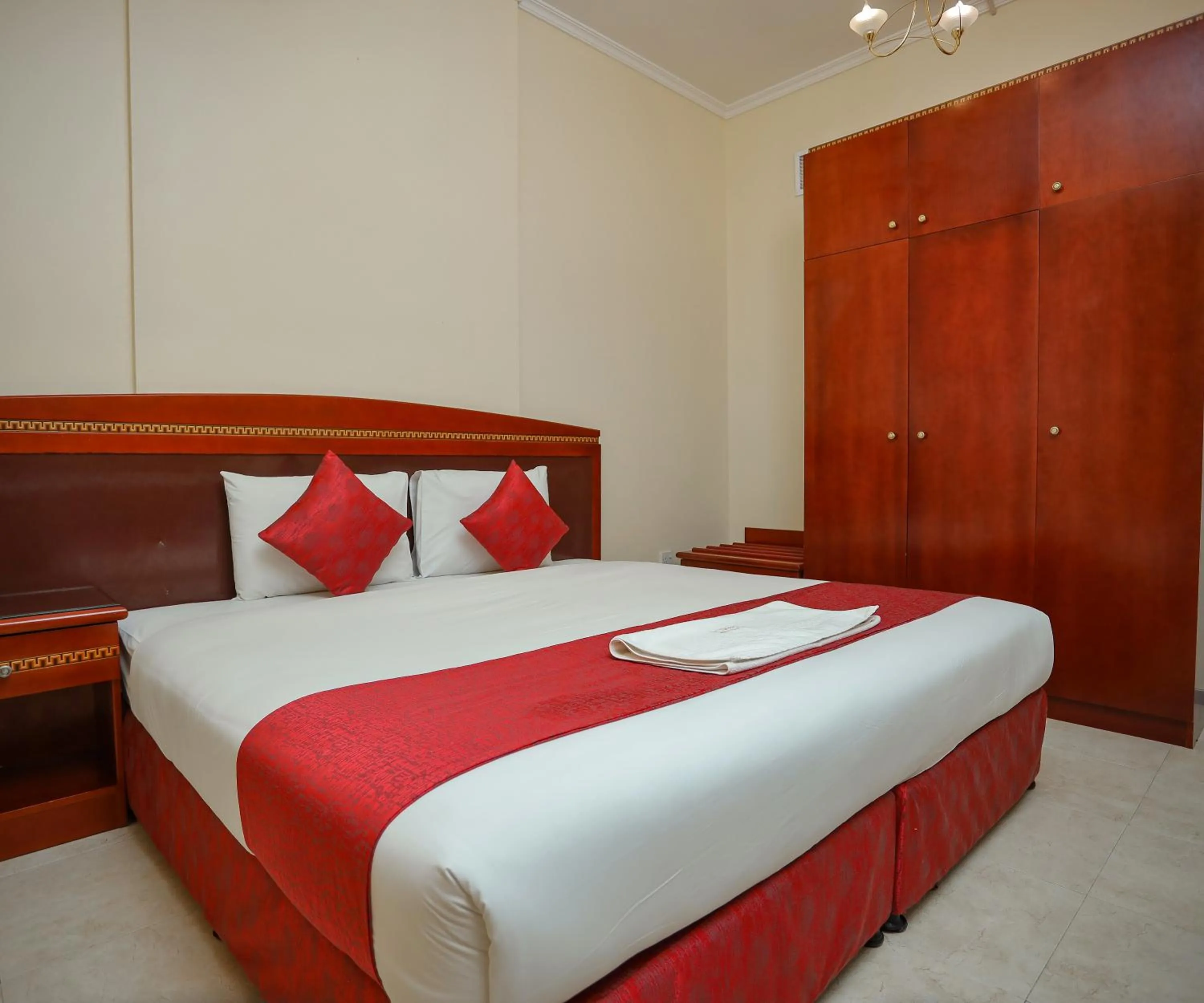 Bed in Al Sharq Hotels Suites