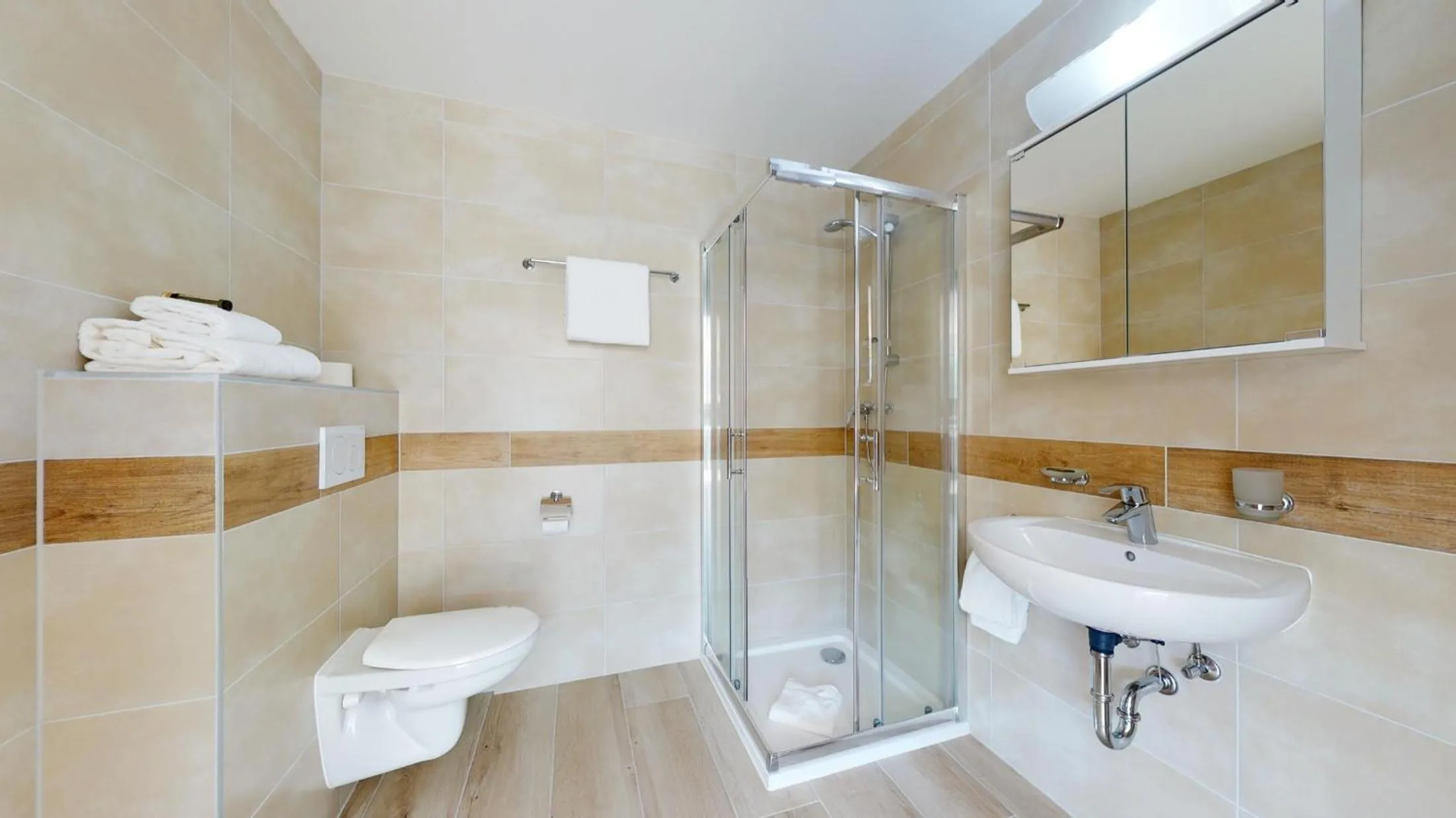 Bathroom in Nonanteneuf appart hōtel Aigle - contactless check-in