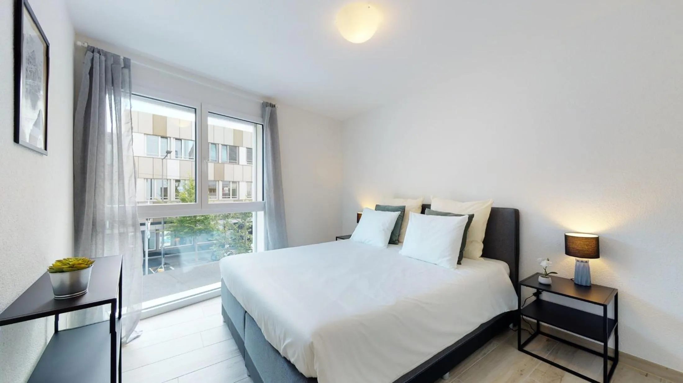 Bedroom, Bed in Nonanteneuf appart hōtel Aigle - contactless check-in