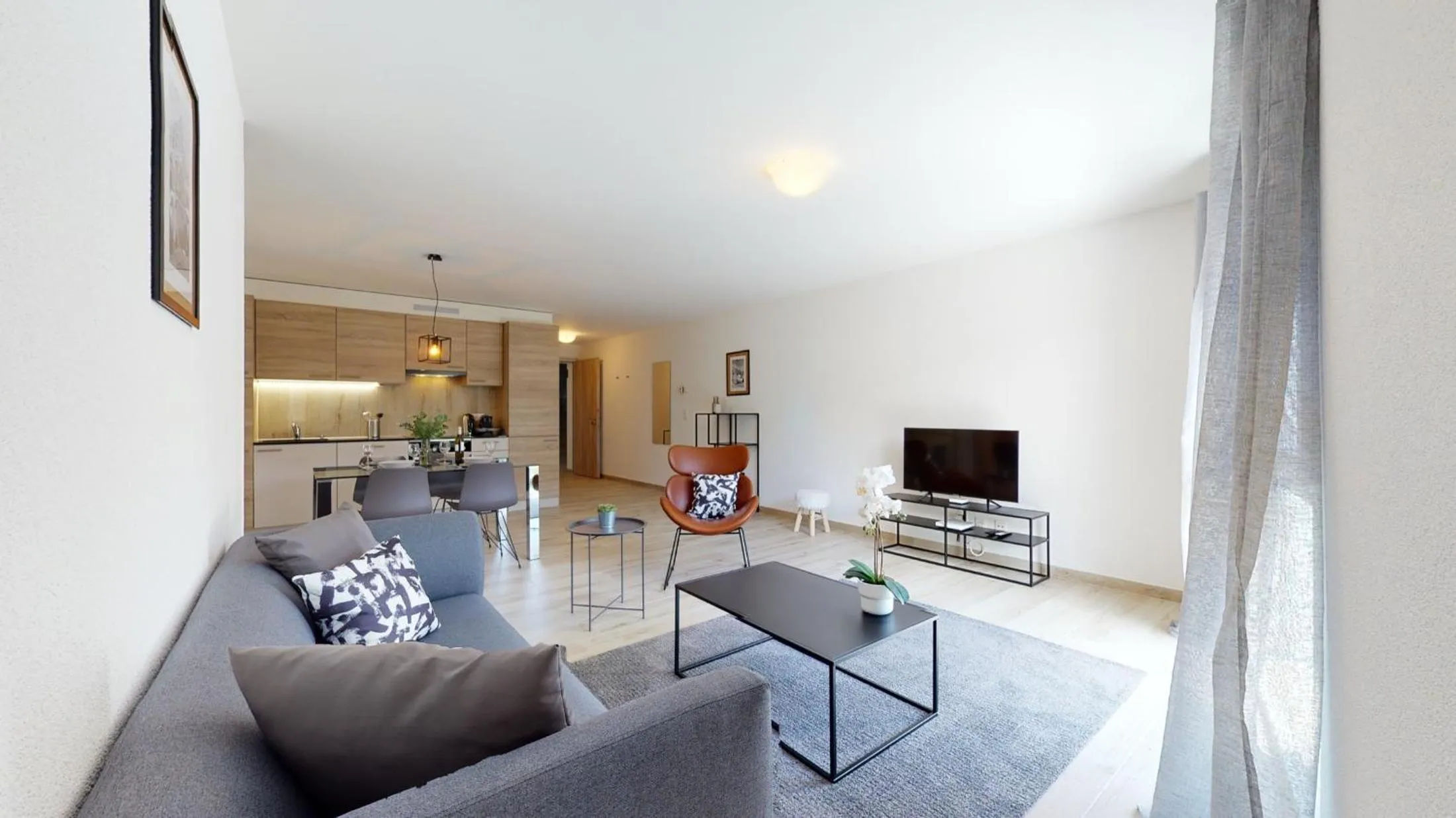 Living room in Nonanteneuf appart hōtel Aigle - contactless check-in