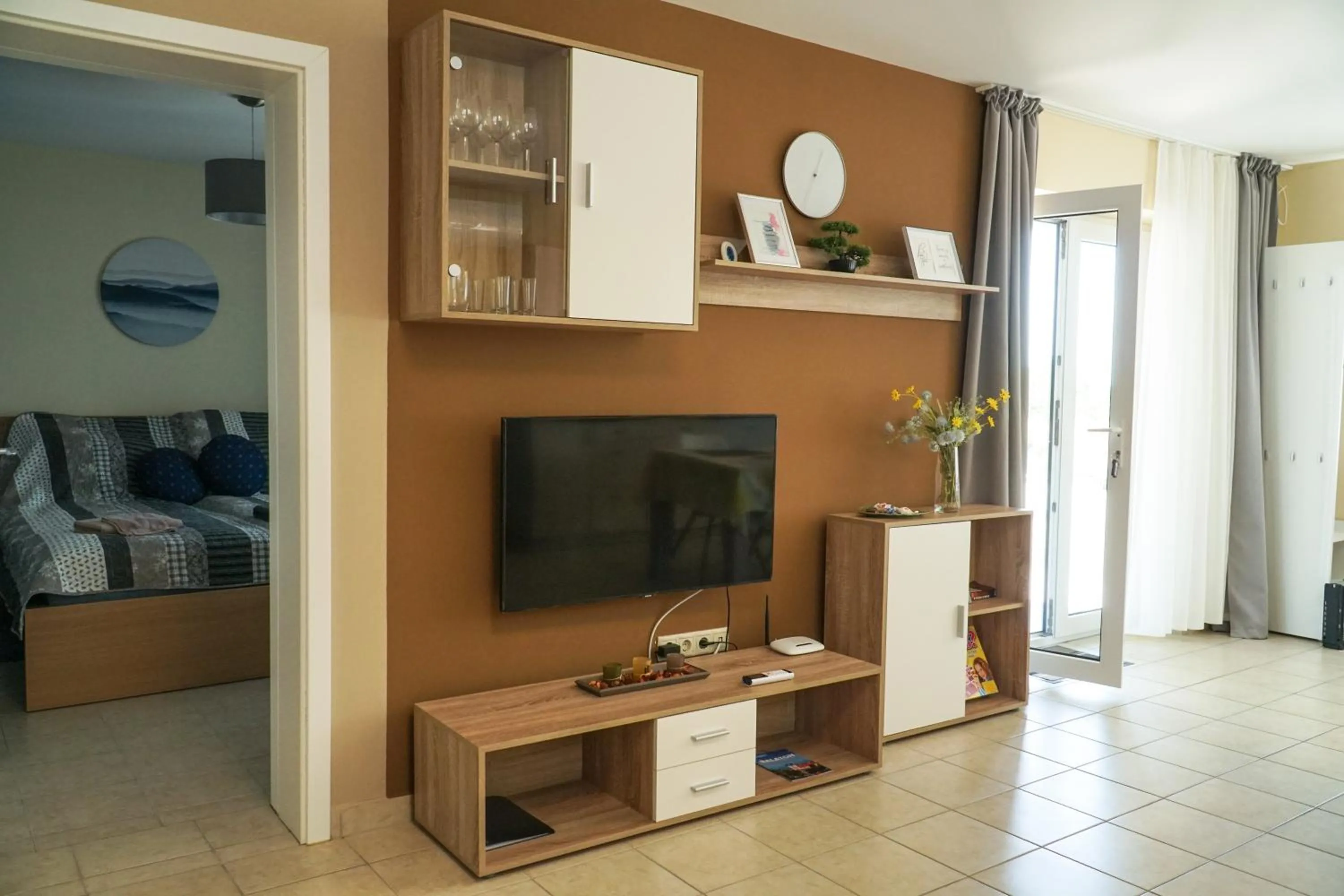 Communal lounge/ TV room in Fügefa Apartman