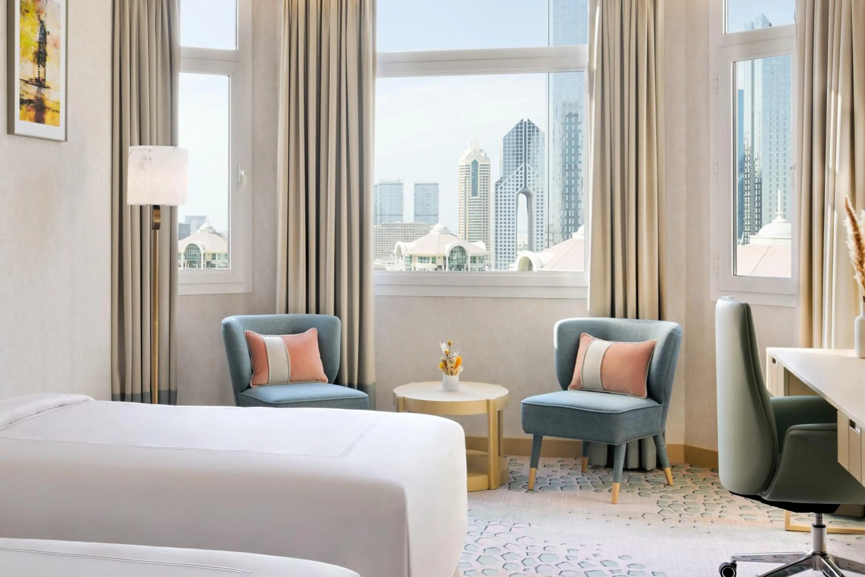 Seating area, Bed in Swissôtel Al Murooj Dubai