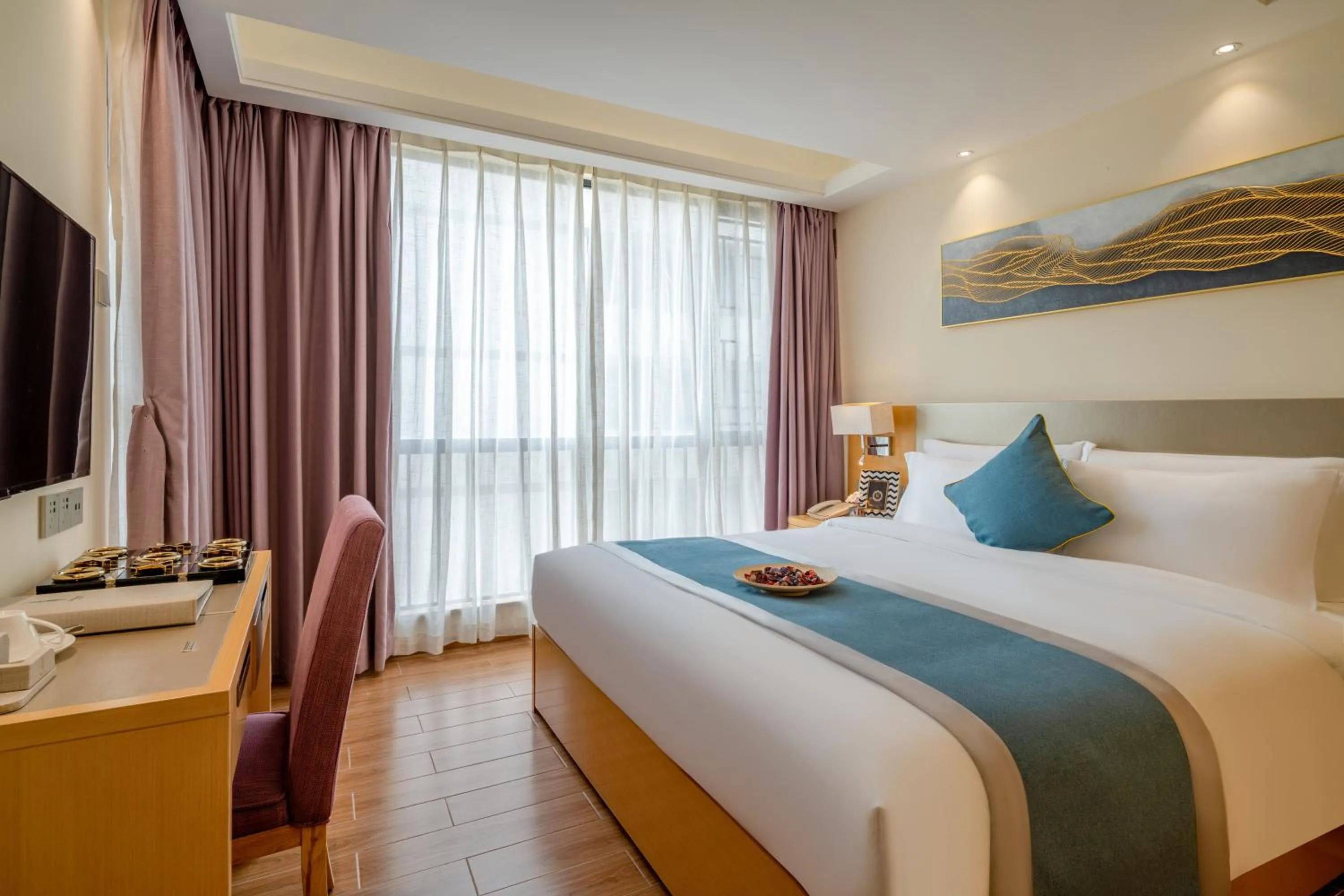 Bed in Dingshang Apartment Hotel