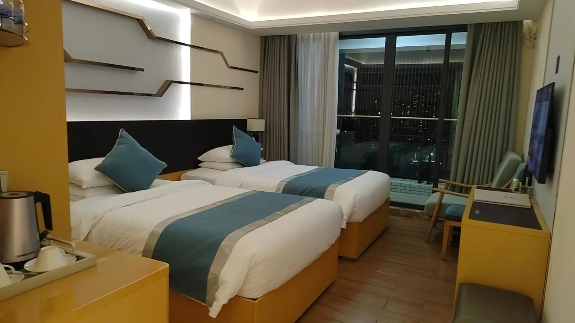 Living room, Bed in Dingshang Apartment Hotel