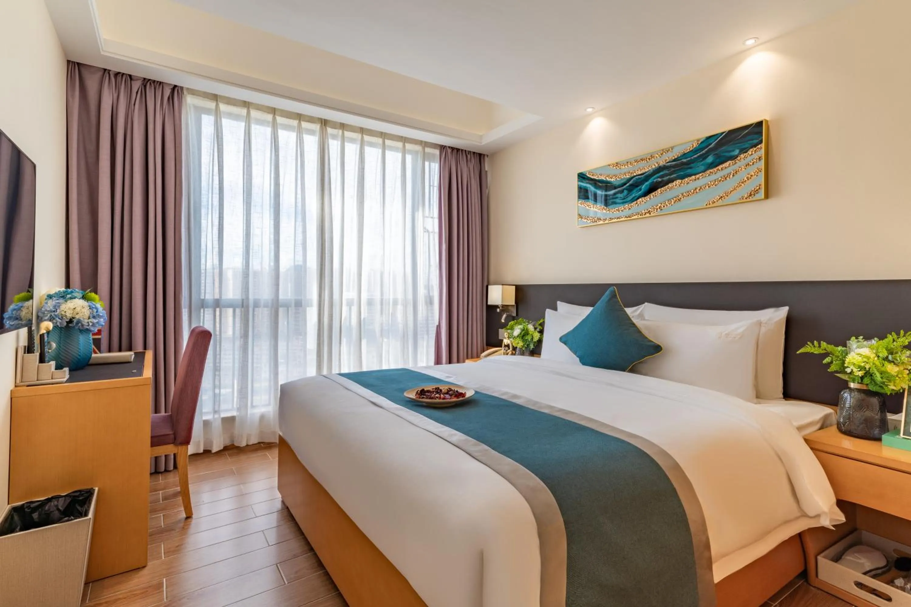 Bed in Dingshang Apartment Hotel