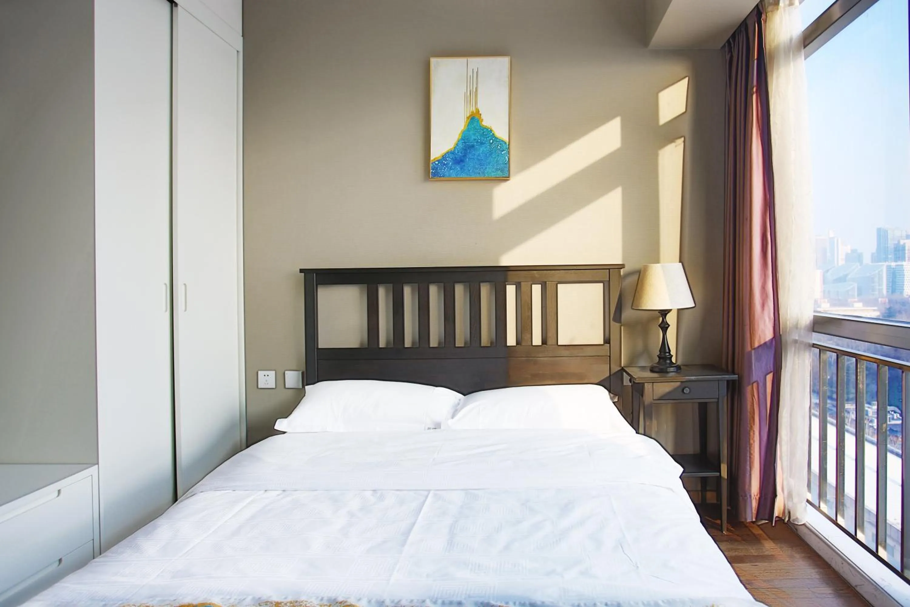 Bed in Yashi International Aparthotel