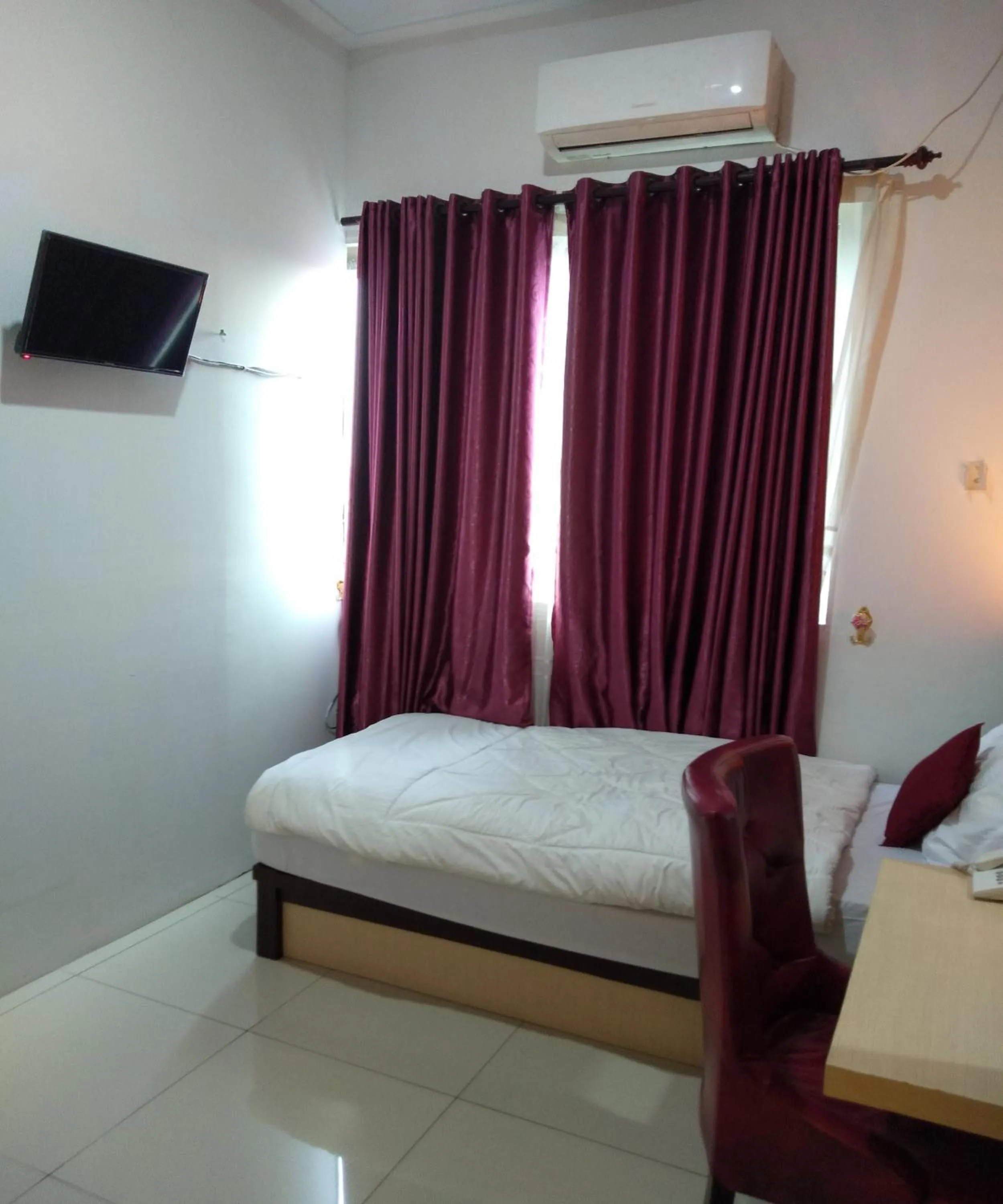 Bed in D&D Guest House & Cafe Syariah