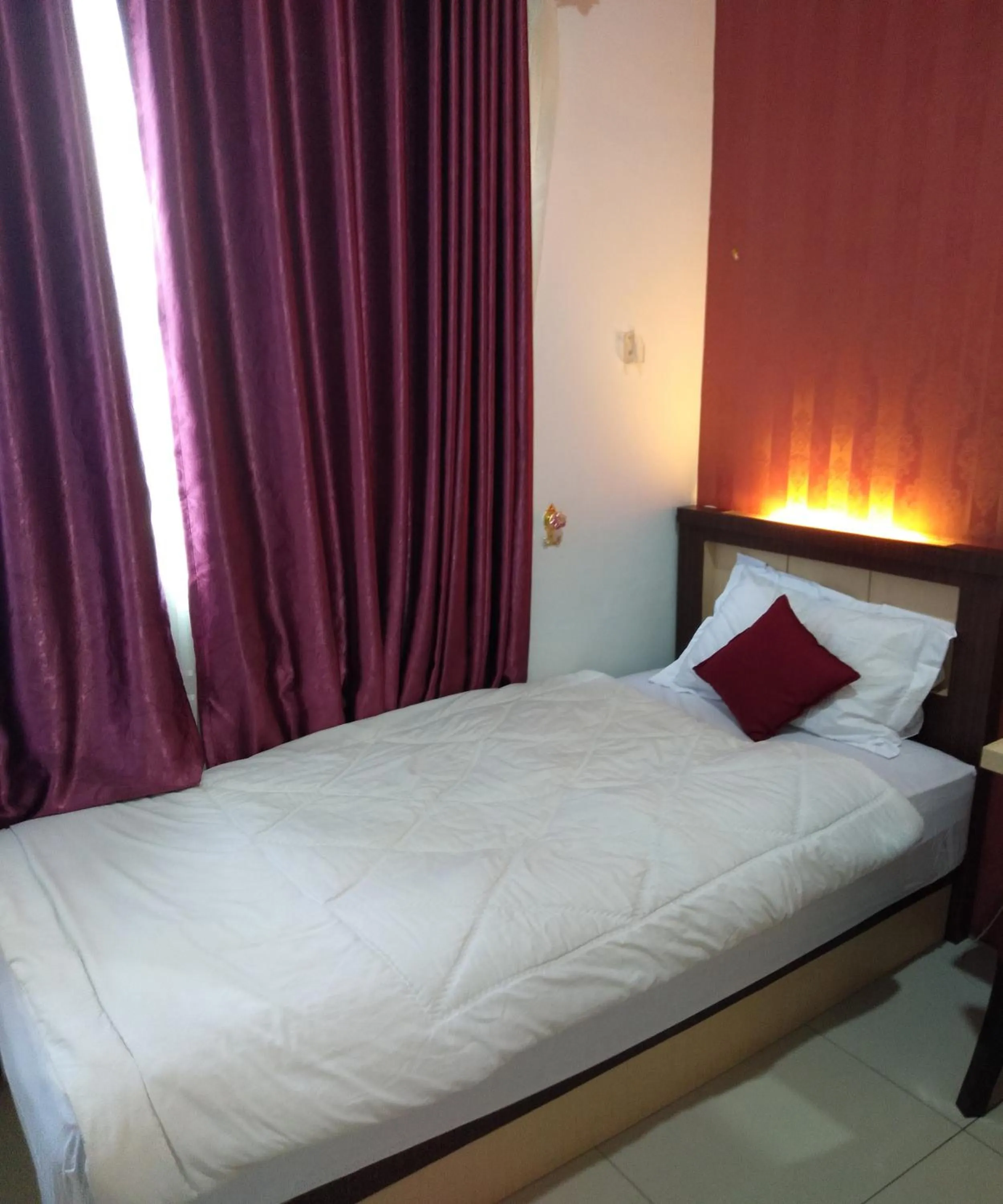 Bed in D&D Guest House & Cafe Syariah