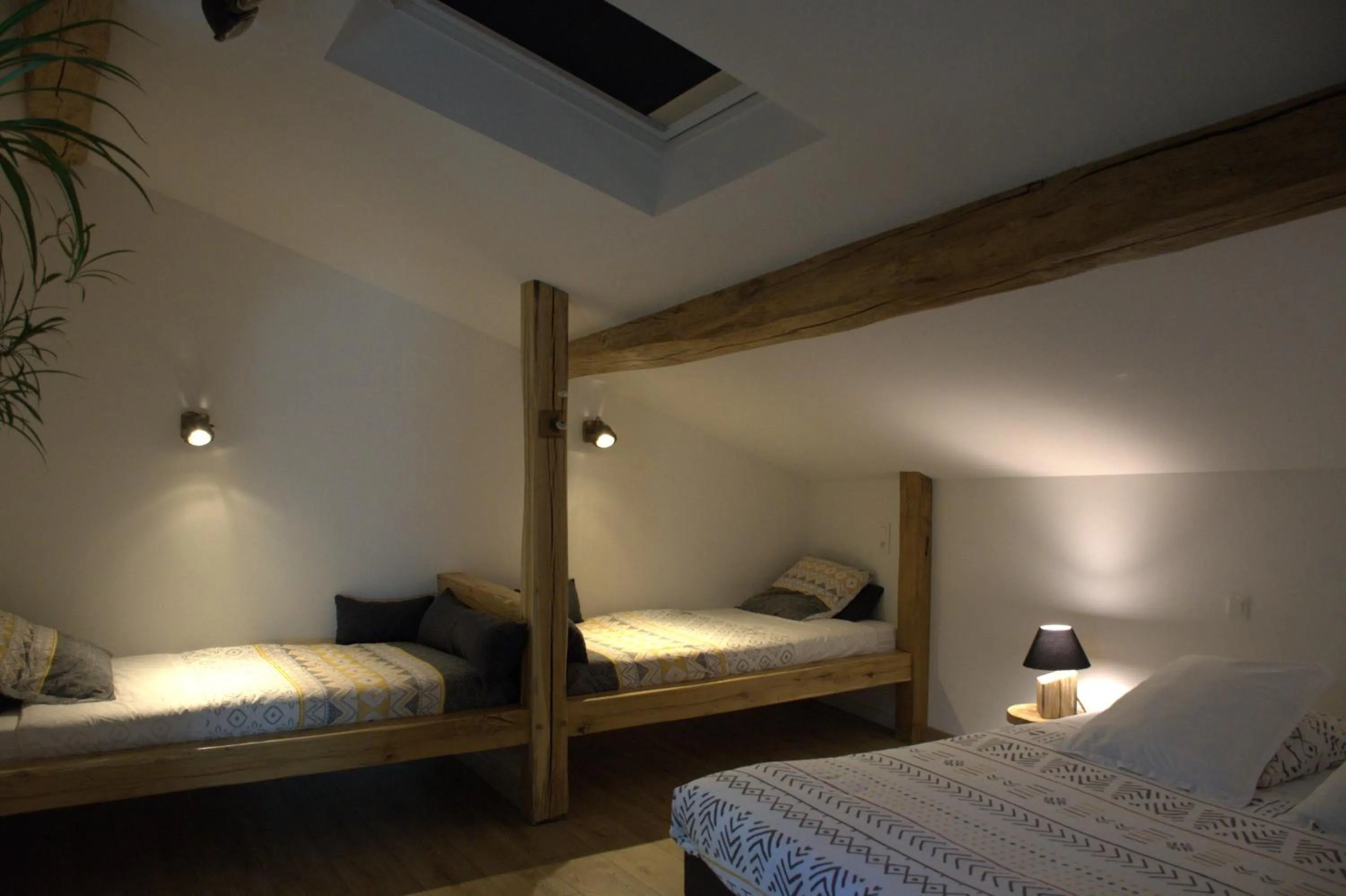 Bed in Le Tamaris Chambres d'hôtes