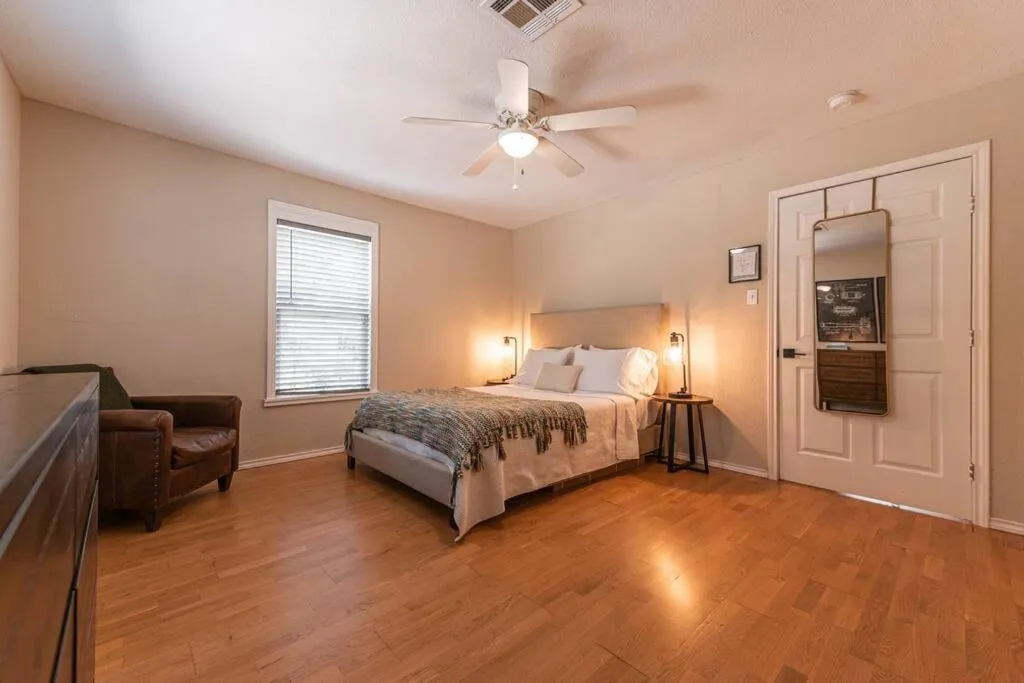 Bed in Escape to a Restored 1920s East Waco Bungalow