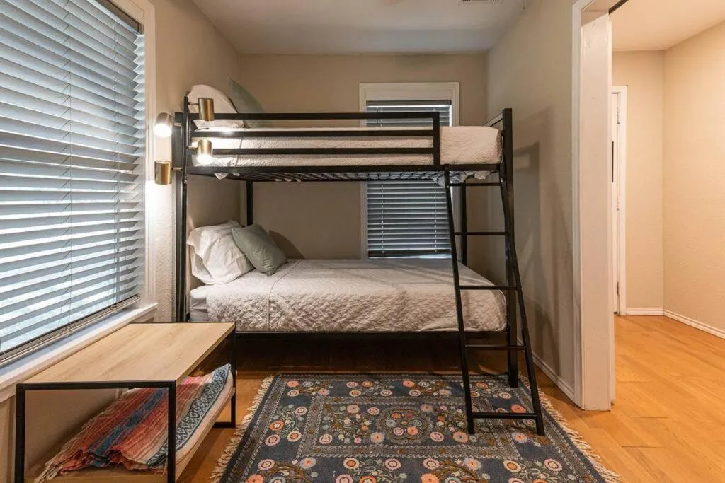 Bed in Escape to a Restored 1920s East Waco Bungalow