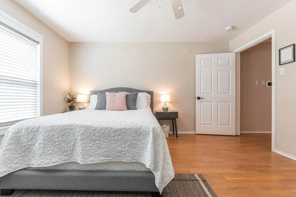 Bed in Escape to a Restored 1920s East Waco Bungalow