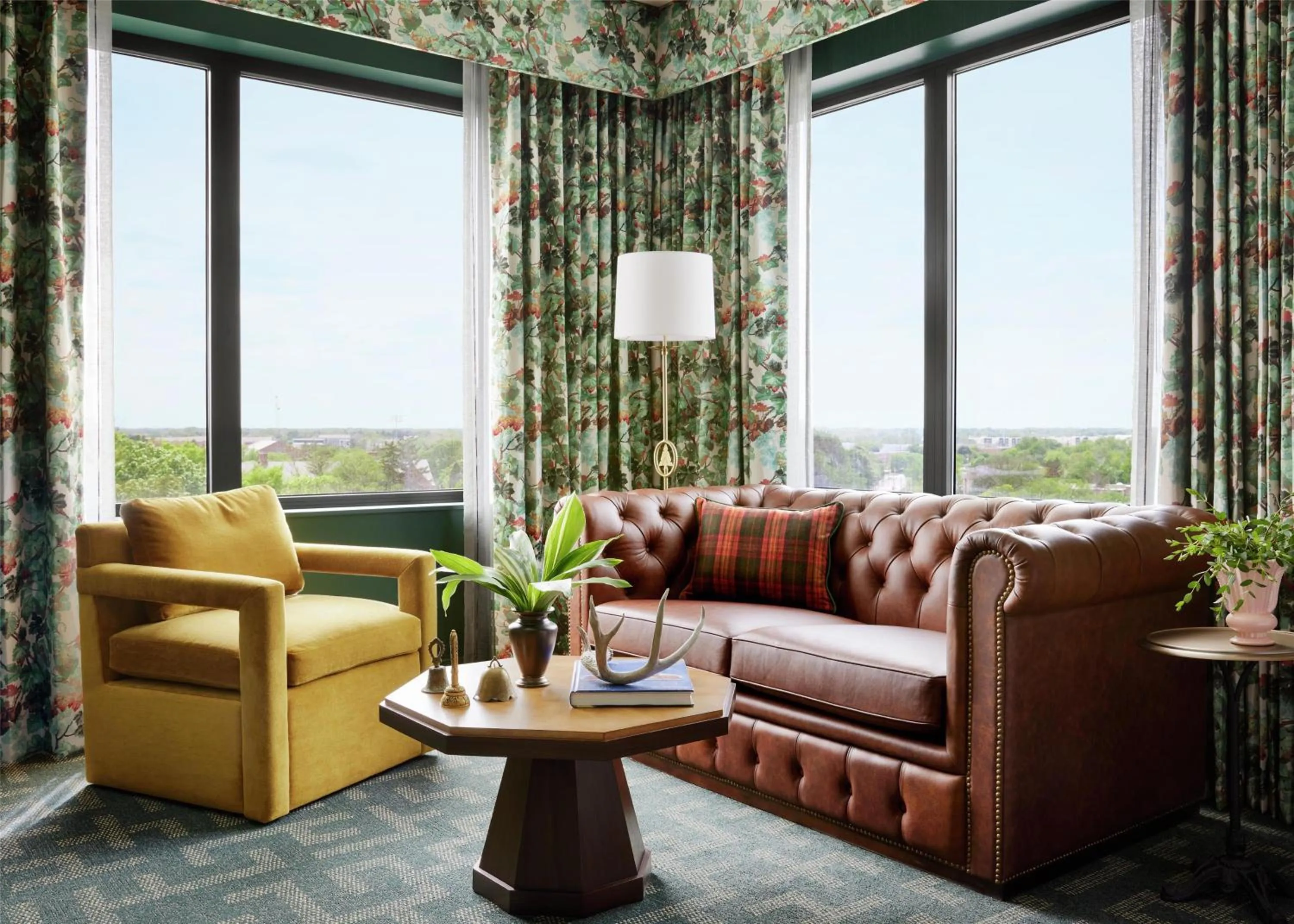 Living room in Graduate by Hilton East Lansing