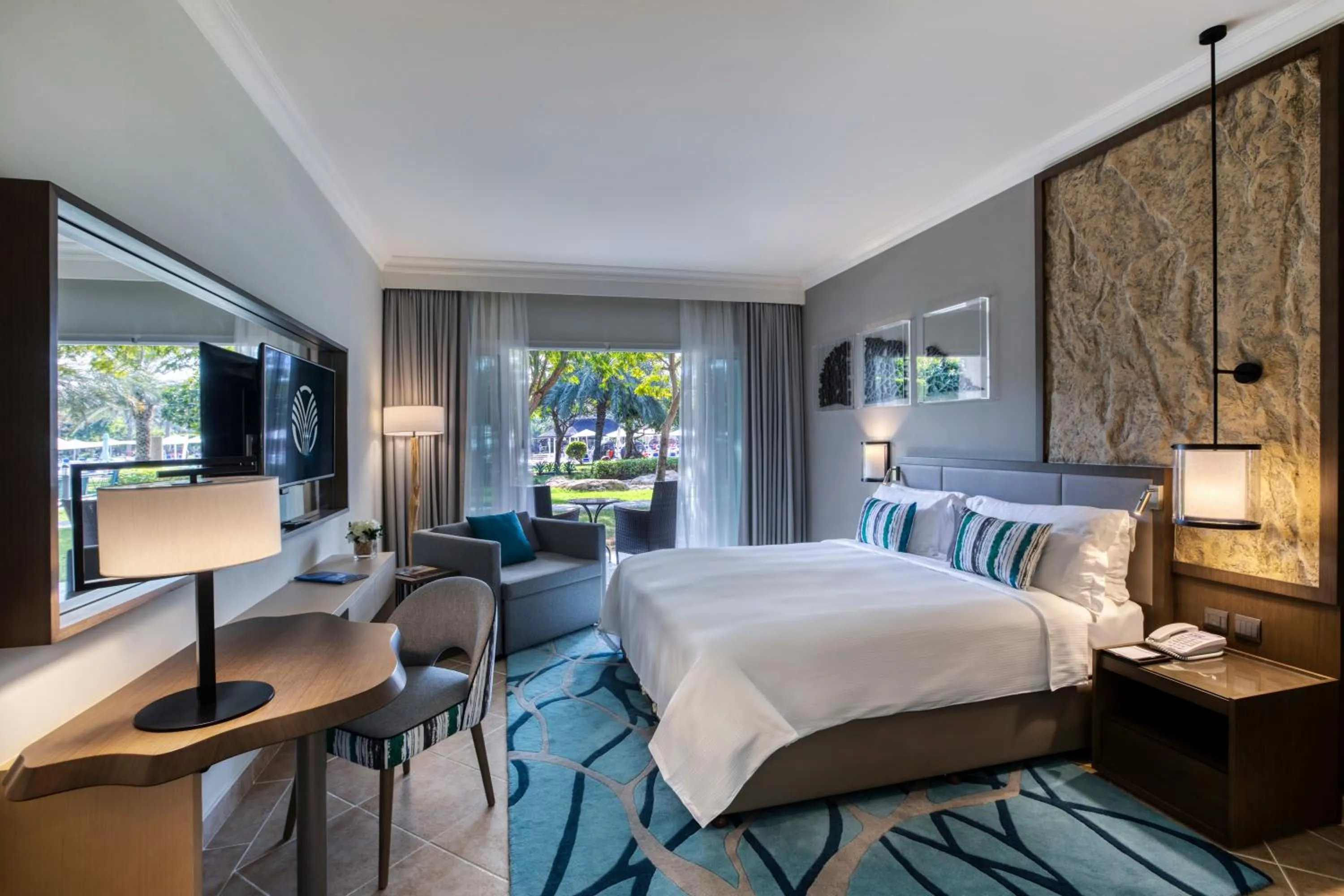 Photo of the whole room, Bed in Fujairah Rotana Resort & Spa - Al Aqah Beach