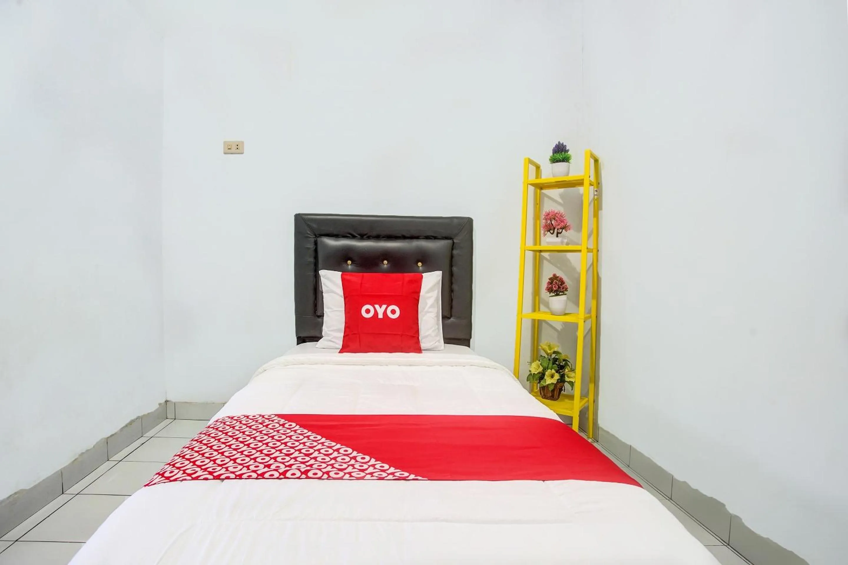 Bedroom in OYO 3994 Wisma Amalia