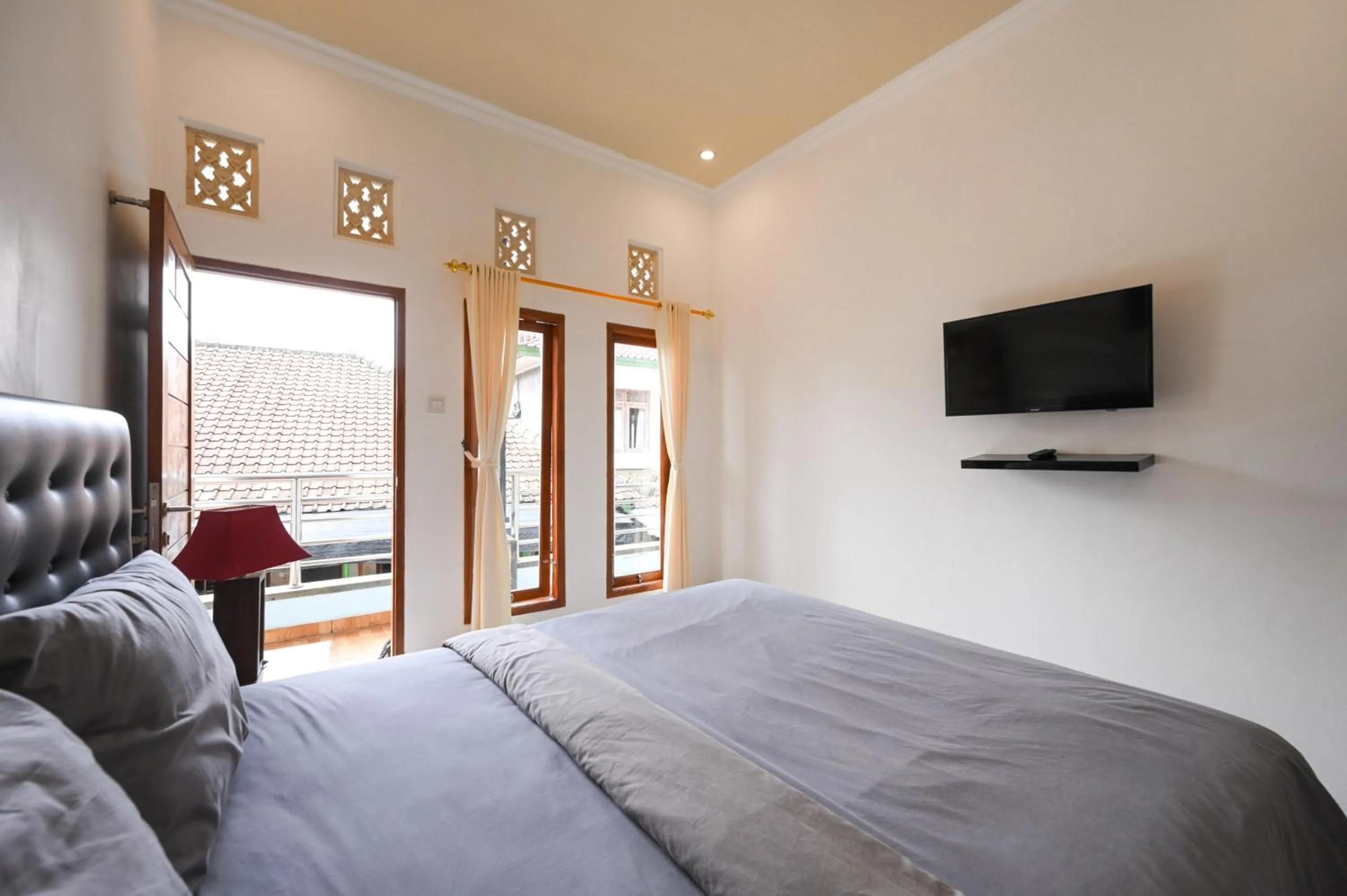 Bedroom, Bed in Ceria Guesthouse Seminyak Mitra RedDoorz