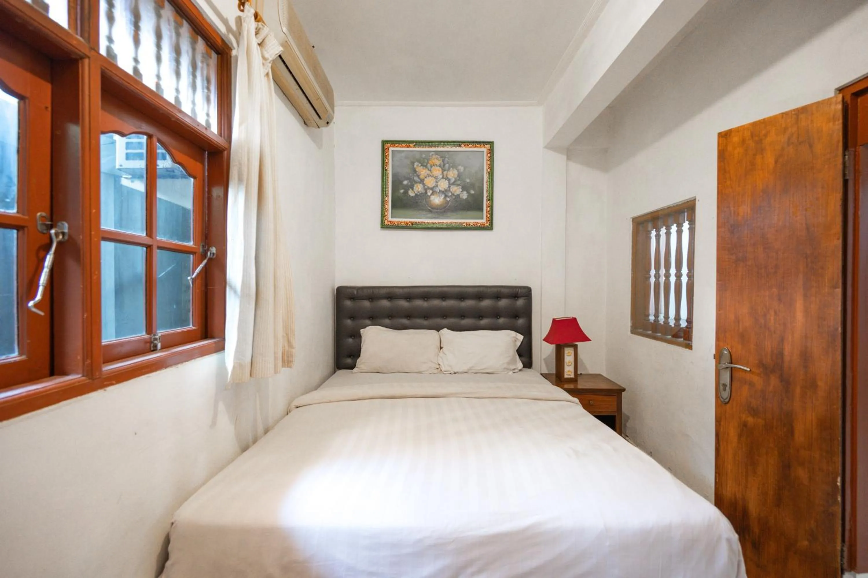 Bedroom, Bed in Ceria Guesthouse Seminyak Mitra RedDoorz