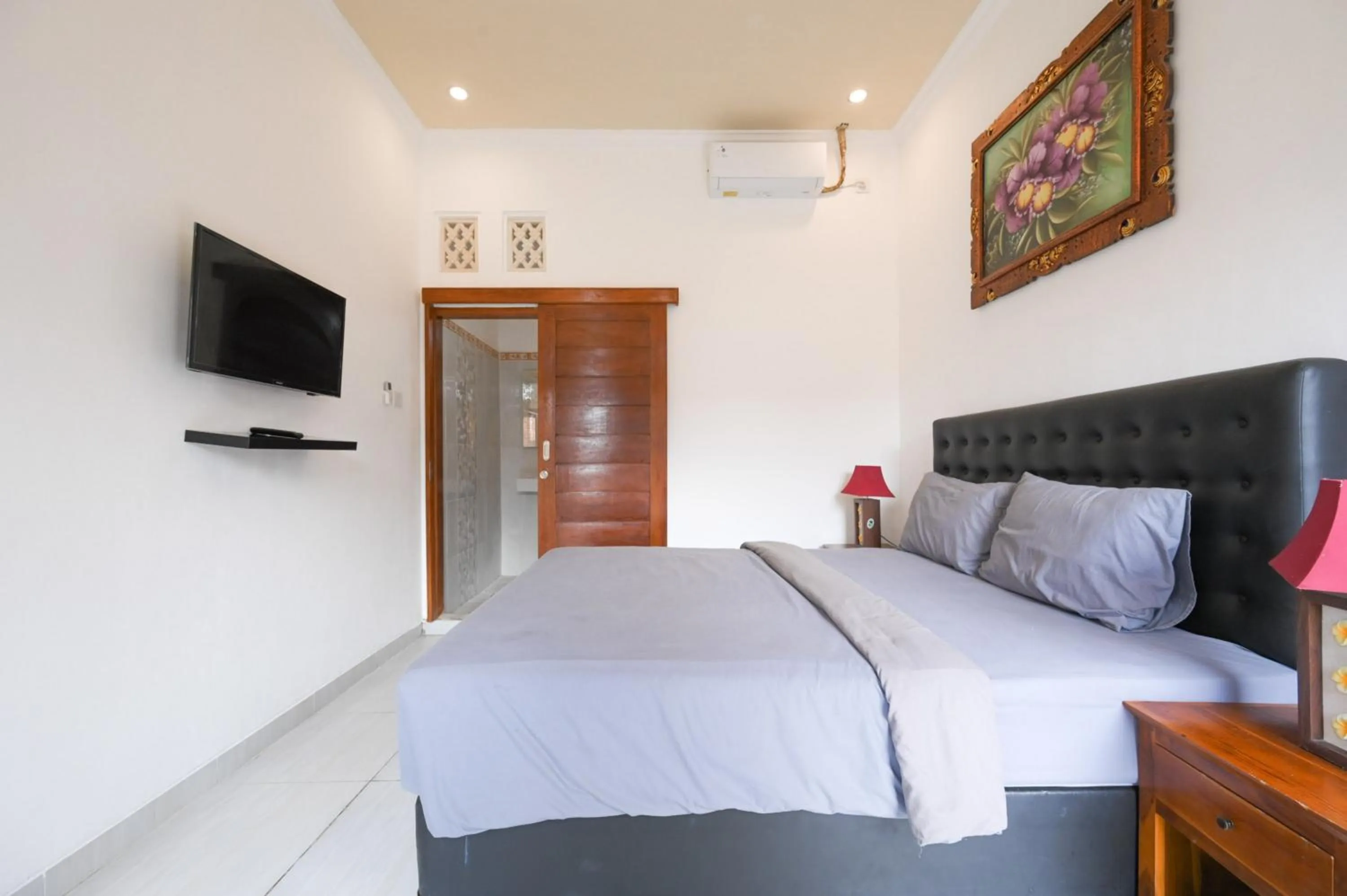 Bedroom, Bed in Ceria Guesthouse Seminyak Mitra RedDoorz