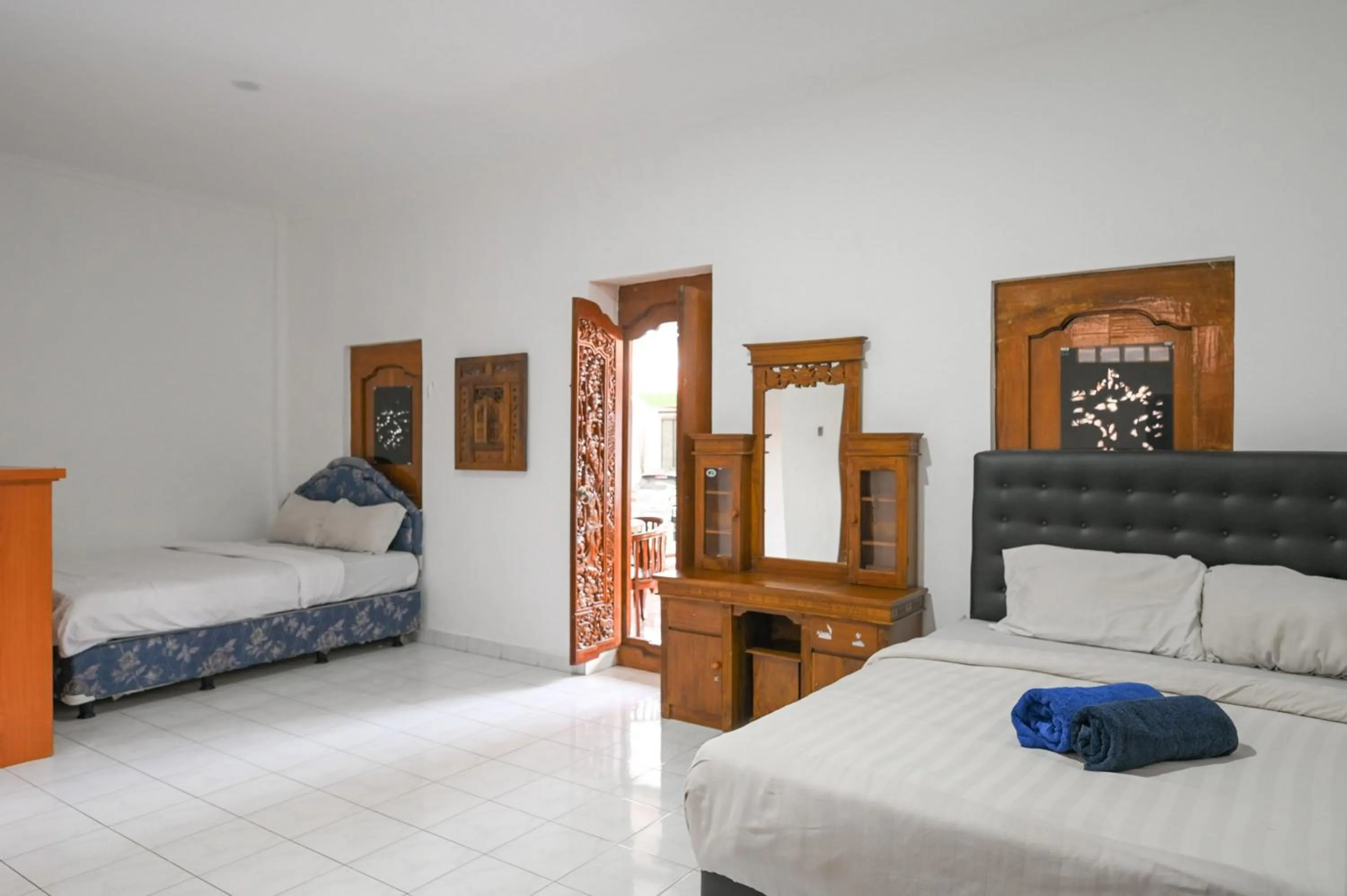 Bedroom, Bed in Ceria Guesthouse Seminyak Mitra RedDoorz
