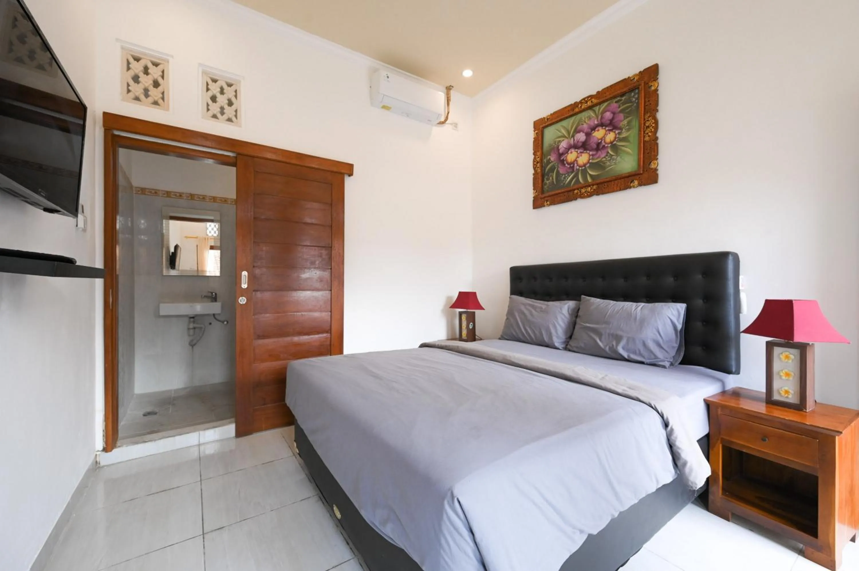 Bedroom, Bed in Ceria Guesthouse Seminyak Mitra RedDoorz